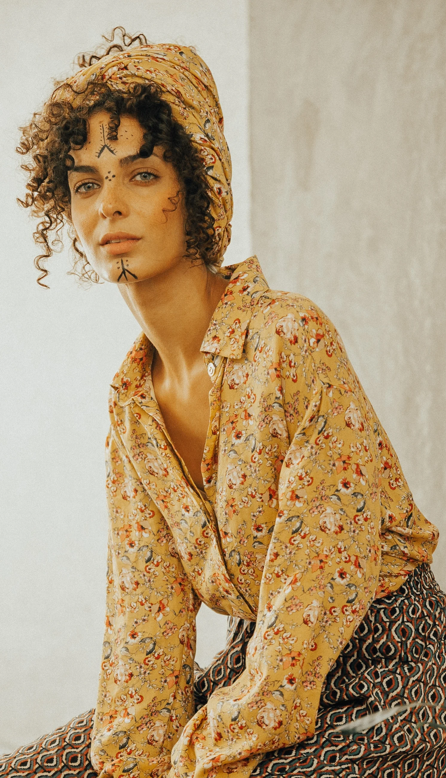 Yellow floral women's dress shirt from Mina Binebine's 'One of a Kind' collection.