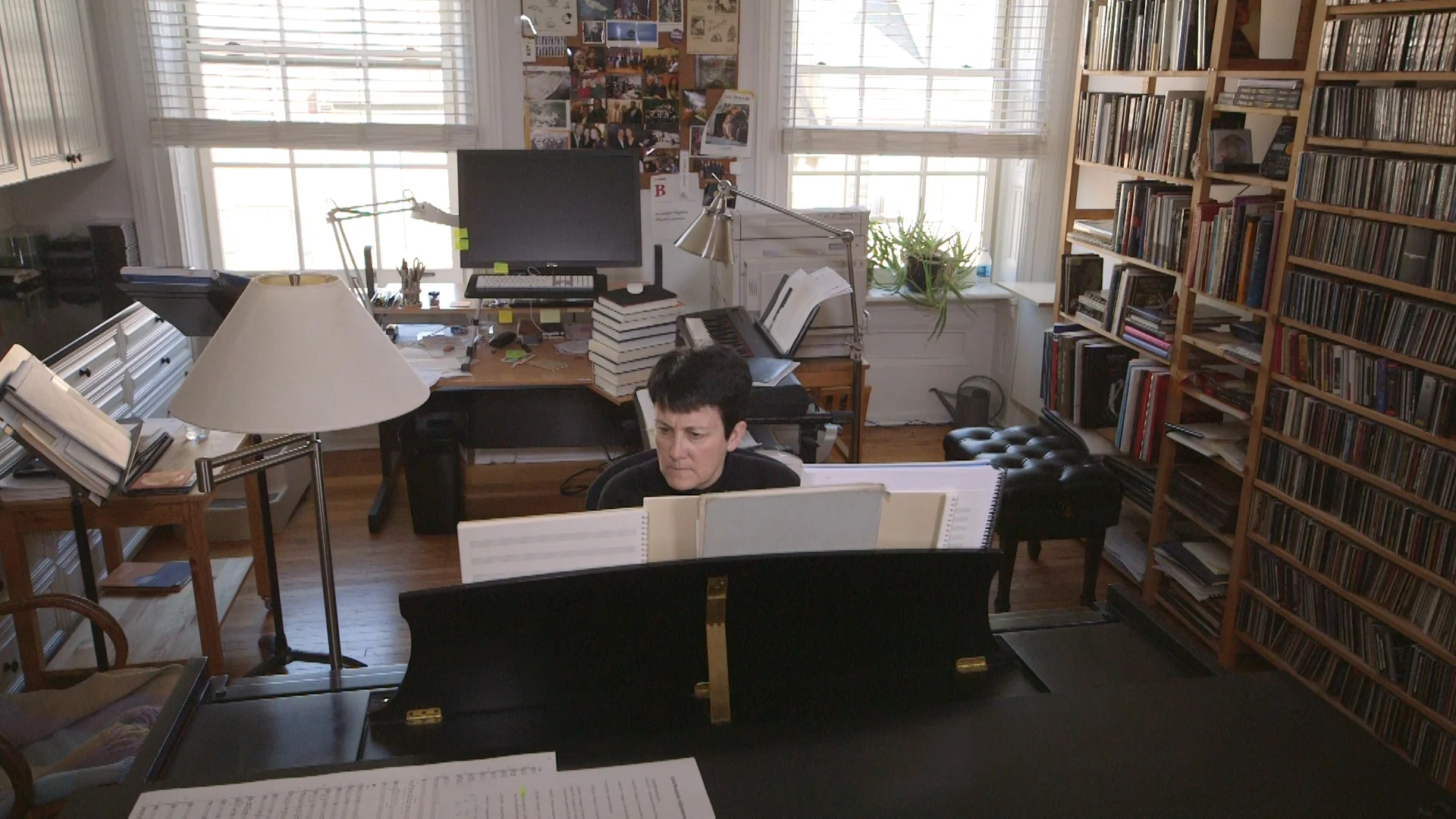 Jennifer Higdon sitting at her piano.jpg