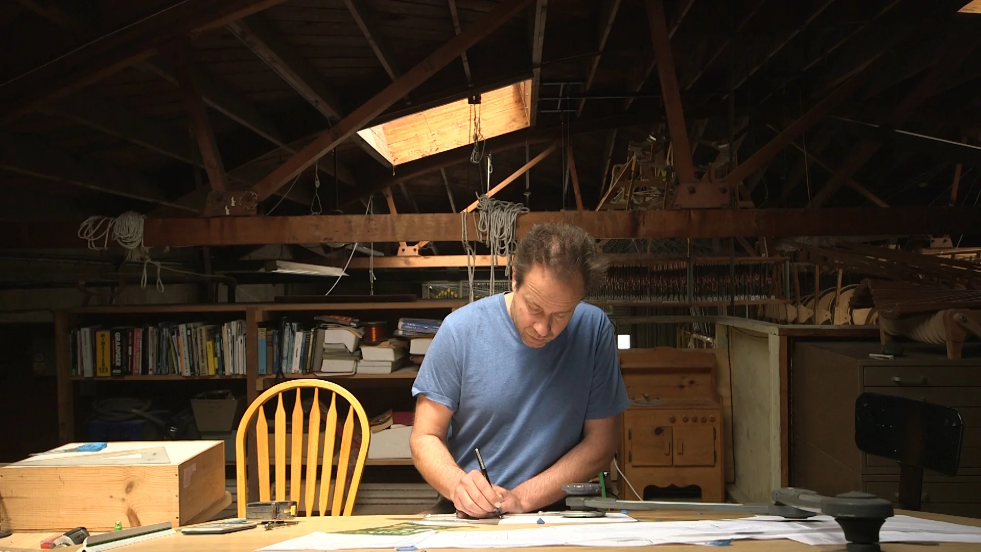 Ruben Margolin planningg in his studio.jpg