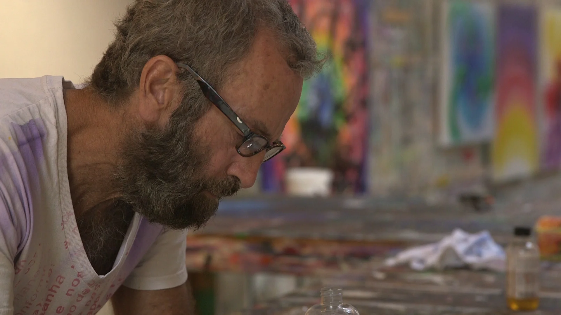 Kenny Scharf in the studio working on his art (1).jpg