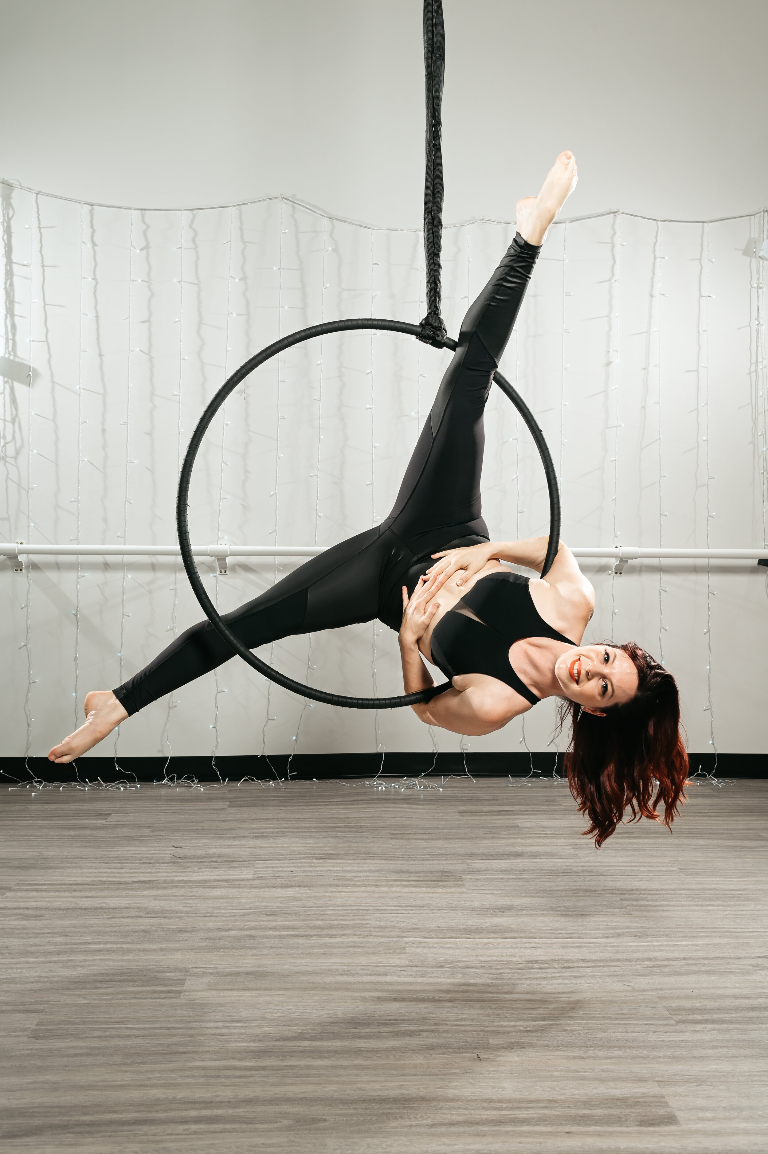 Young Beautiful Slim Circus Artist Holding an Aerial Hoop Posing on a Black  Aqua Studio Background Stock Photo - Image of body, black: 126730212