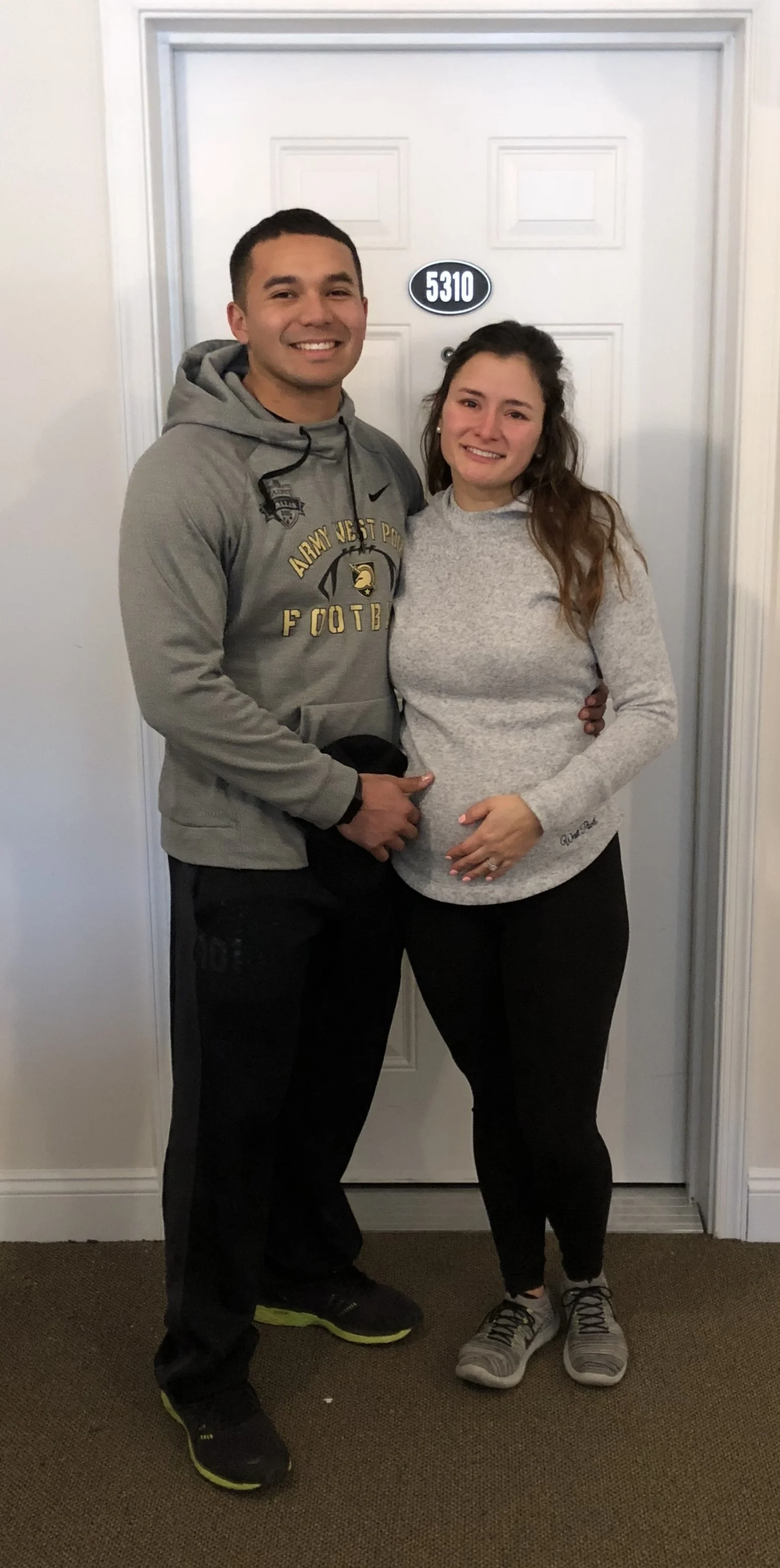 The very last picture we took at our apartment. I had been bursting into tears all morning without warning and as seen in the cover photo, only composed myself long enough to take this. We thought, "When we moved in, it was just us two. Now we have …