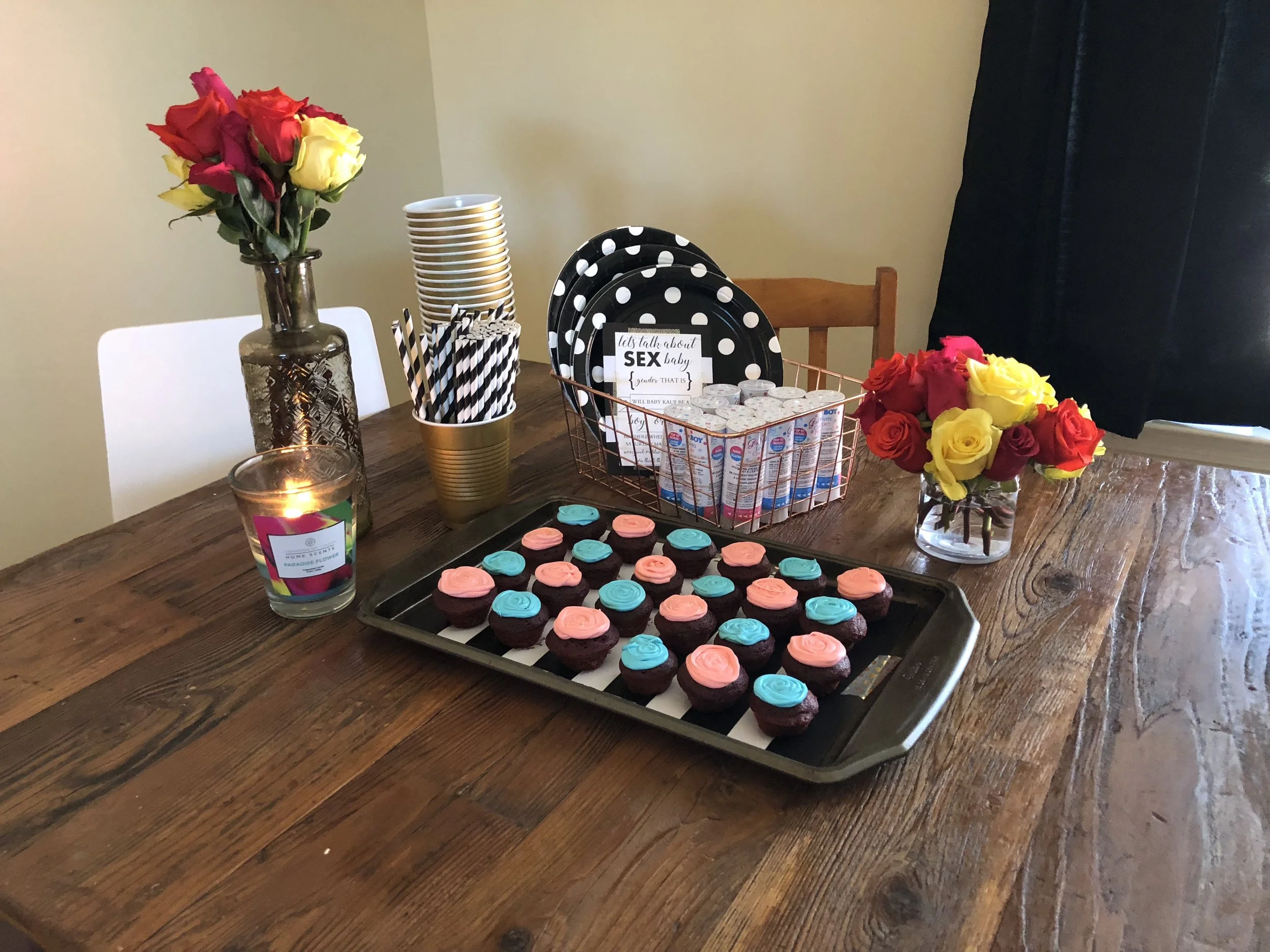 All the table settings and desserts. I had made those small red velvet cupcakes (because red velvet is my absolute favorite!) and made the pink and blue frosting into looking a little rose-like. The roses were a product of Matthew shopping for me an…
