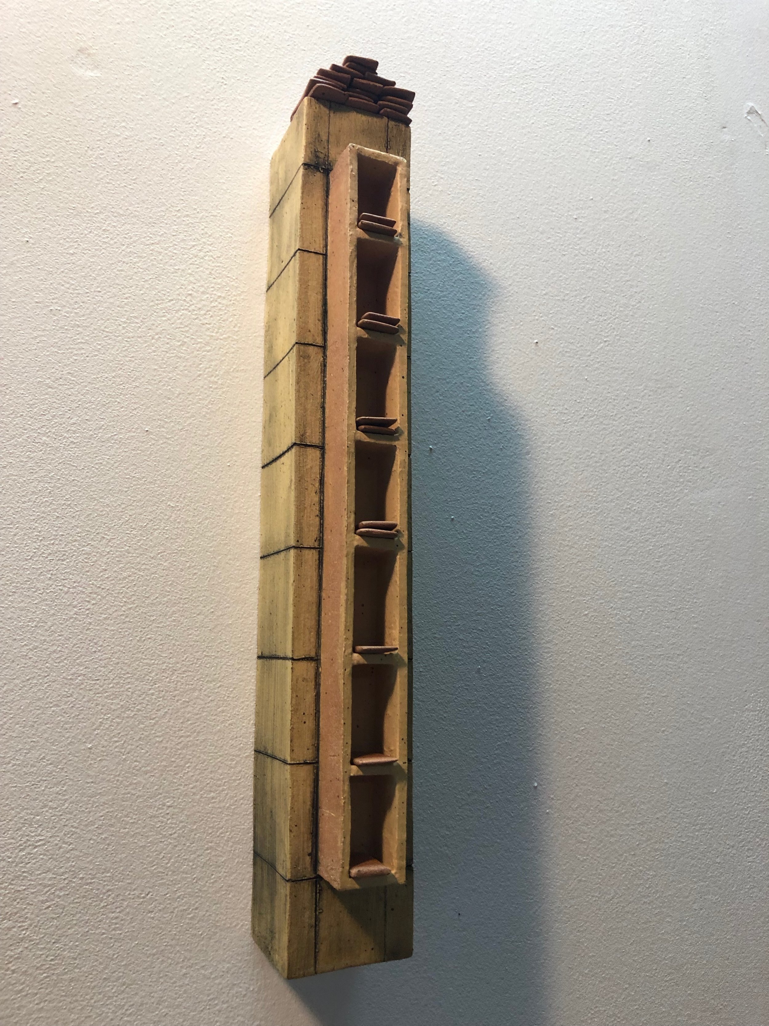almost bought this piece by louisa neill , but a couple returned to purchase it just as i was asking the price. movable tiles, representing time passing (seven days of the calendar).