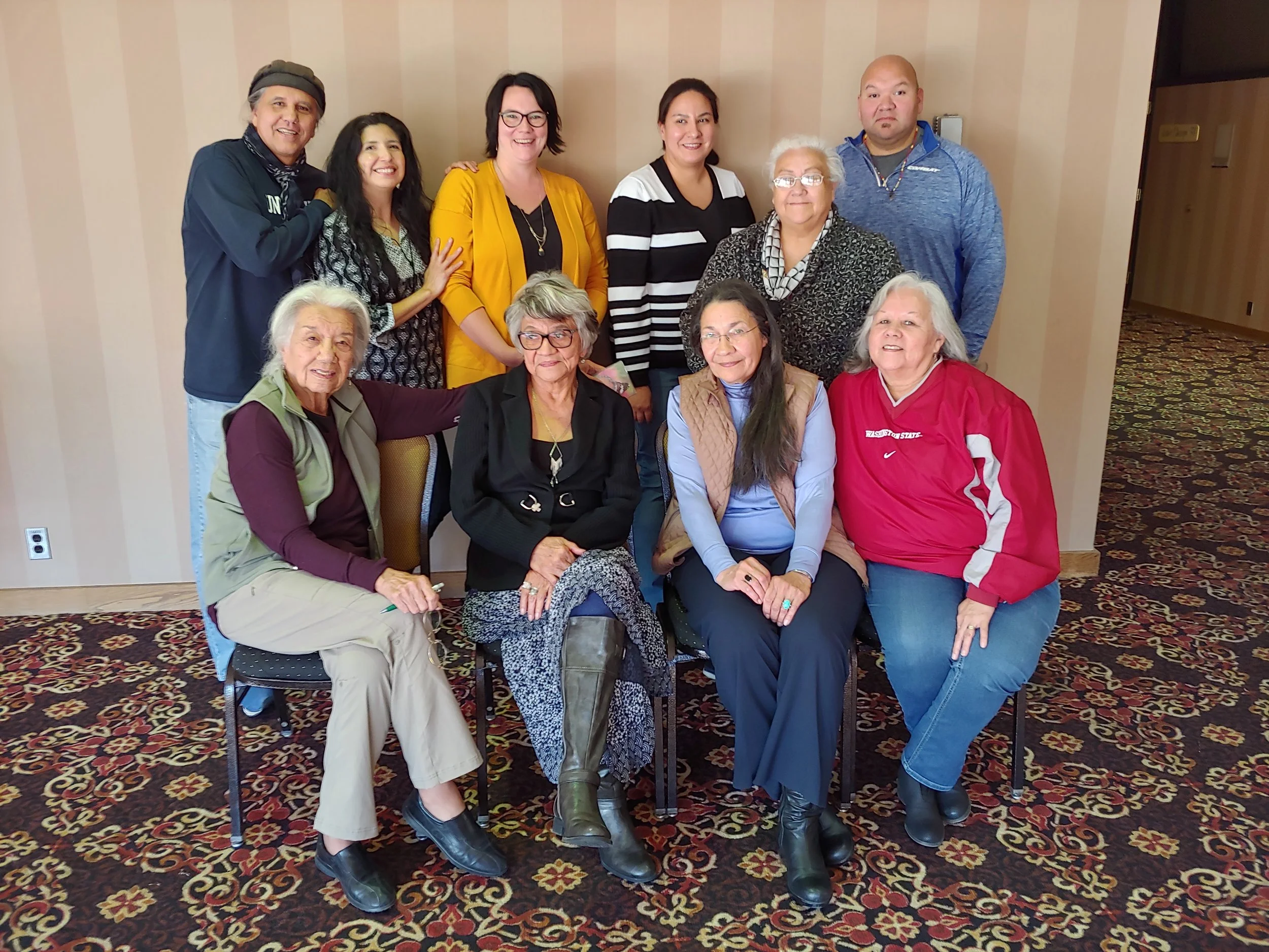 Reorganizing business meeting of the Oak Lake Writers Society in Pierre, SD, on October 20, 2018. Members in attendance (left to right, back row) Edward Valandra, Mabel Picotte (OLWS Chair), Tasiyagnunpa (Livermont) Barondeau (OLWS Sec/Treas), Sarah Hernandez (OLWS Director), Deanna Stands, Ross DuBray, (left to right, front row) Elizabeth Cook-Lynn, Lydia Whirlwind Soldier, Lanniko Lee, Patty Bordeaux Nelson. Present via phone Tate Walker (unpictured).