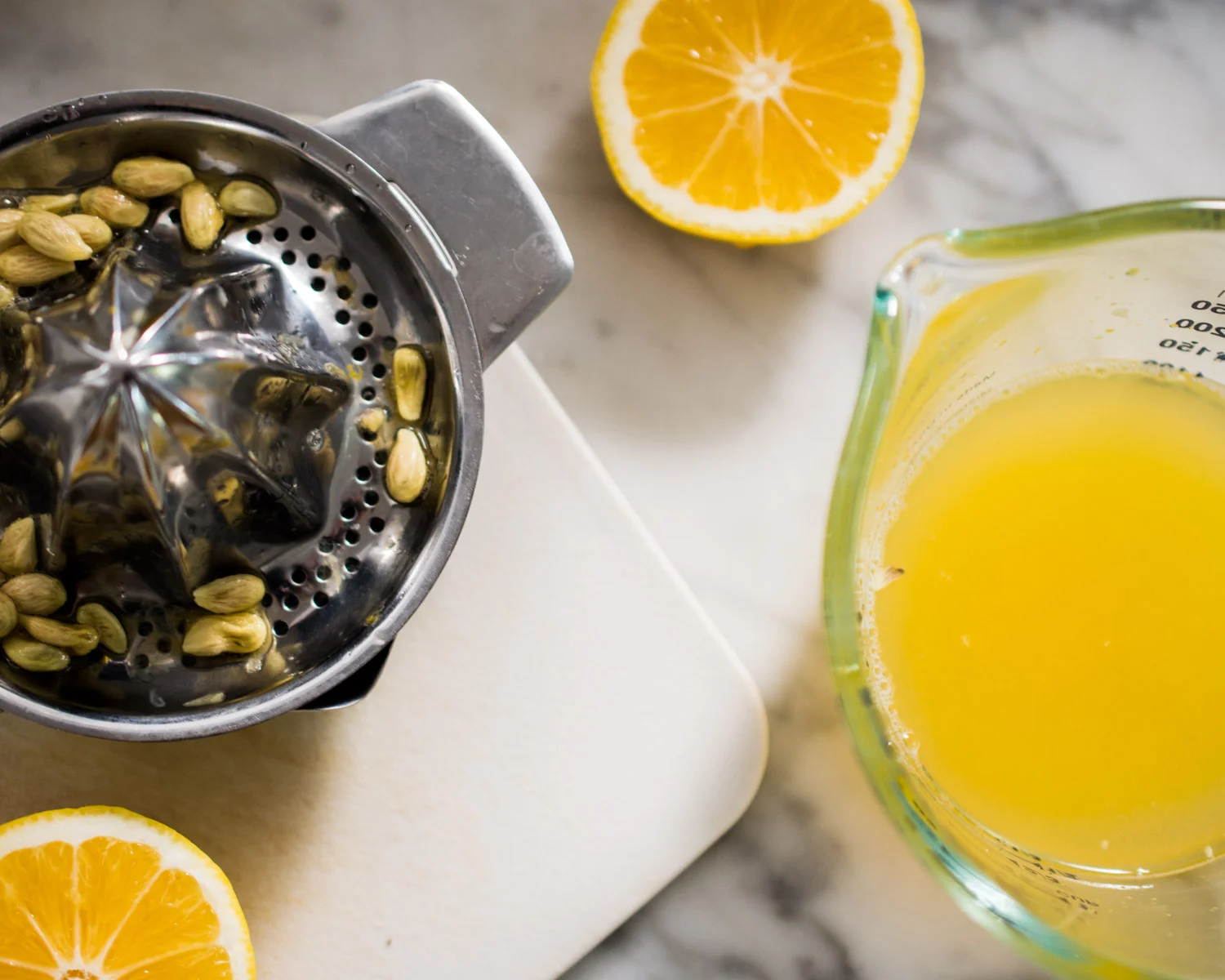 Juicing Meyer lemons.