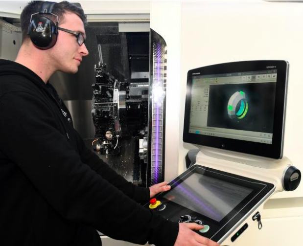 Mike Thompson programmes the semi-automated twin spindle lathe DMG Mori NLX 2500, bought for the TASKA partnership.