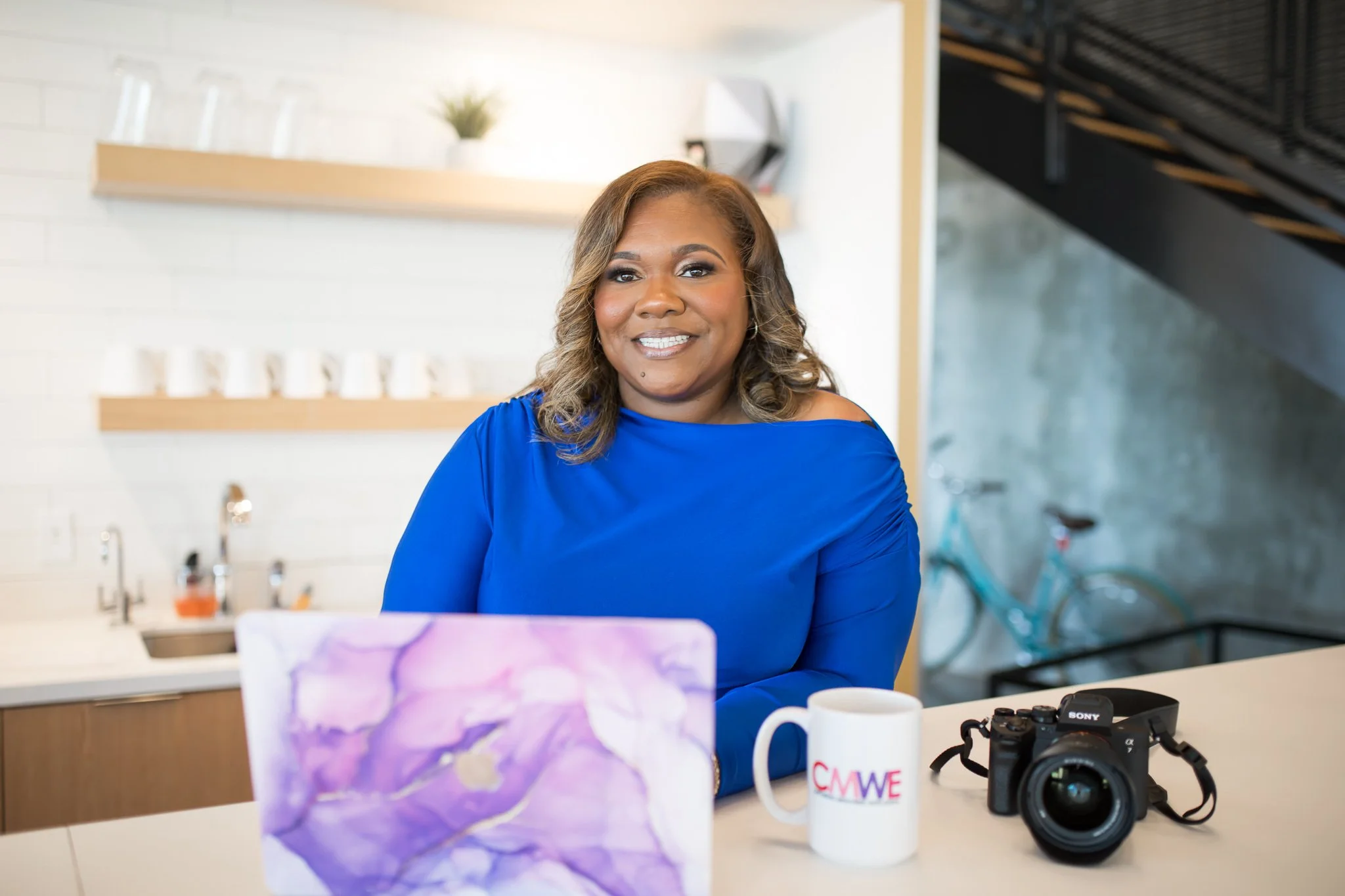 Elena sitting with camera 2.jpg