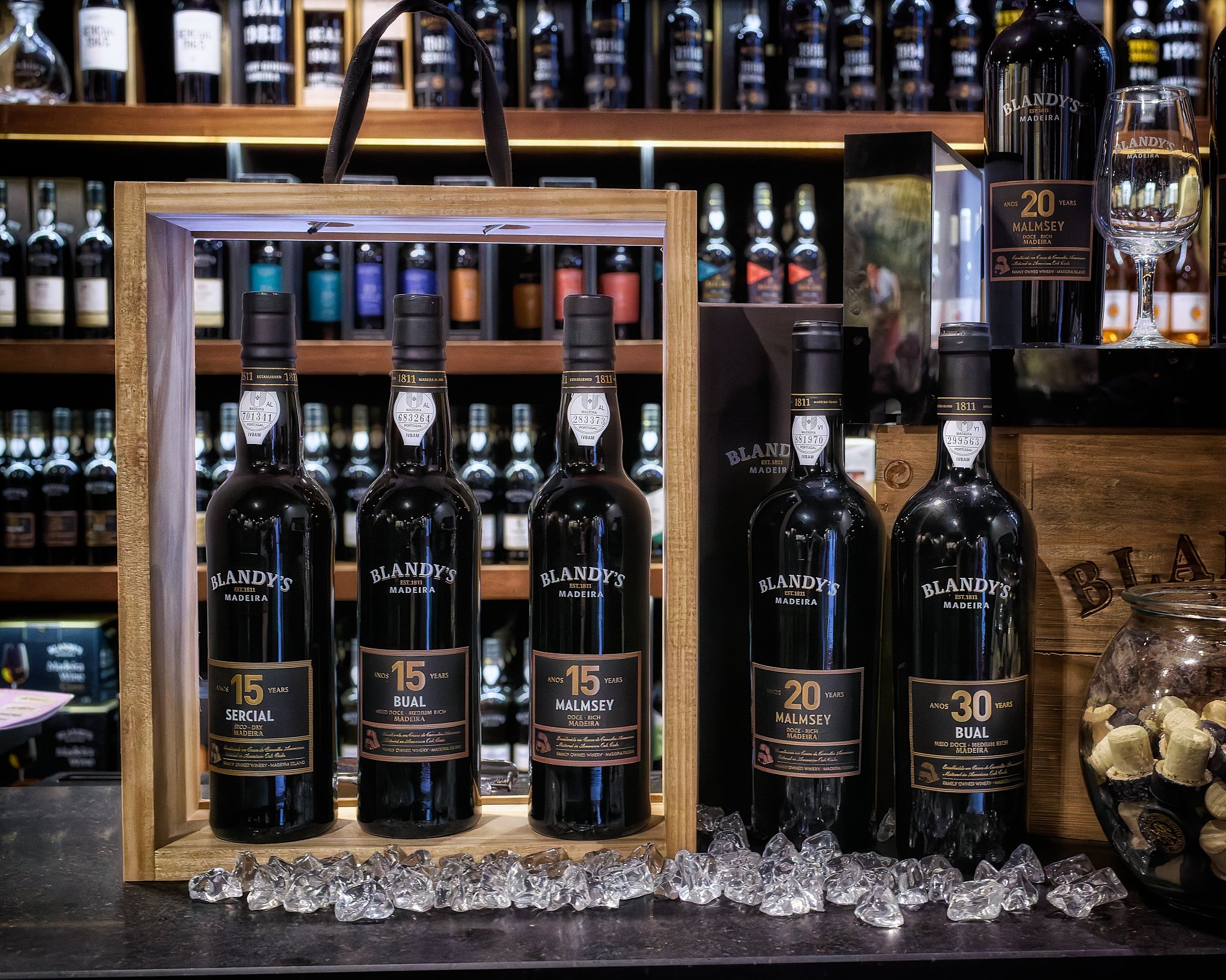 Documentary photography capturing vintage Madiers wine for sale at Blandy’s Wine Lodge, Funchal