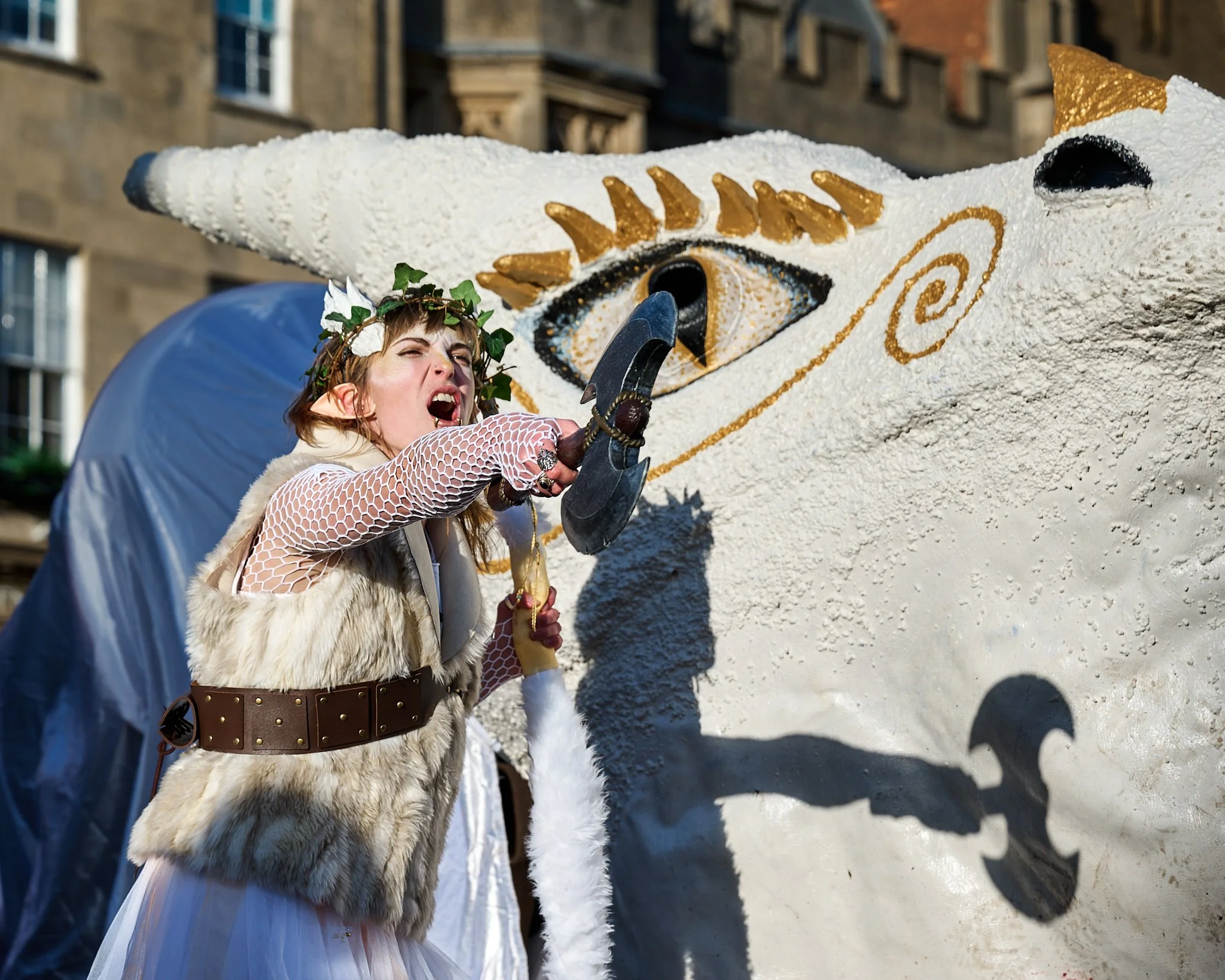 Documentary fieldwork photograph of Celtic Samhain Wild Hunt in Glastonbury, showing the White Dragon leader in battle cry