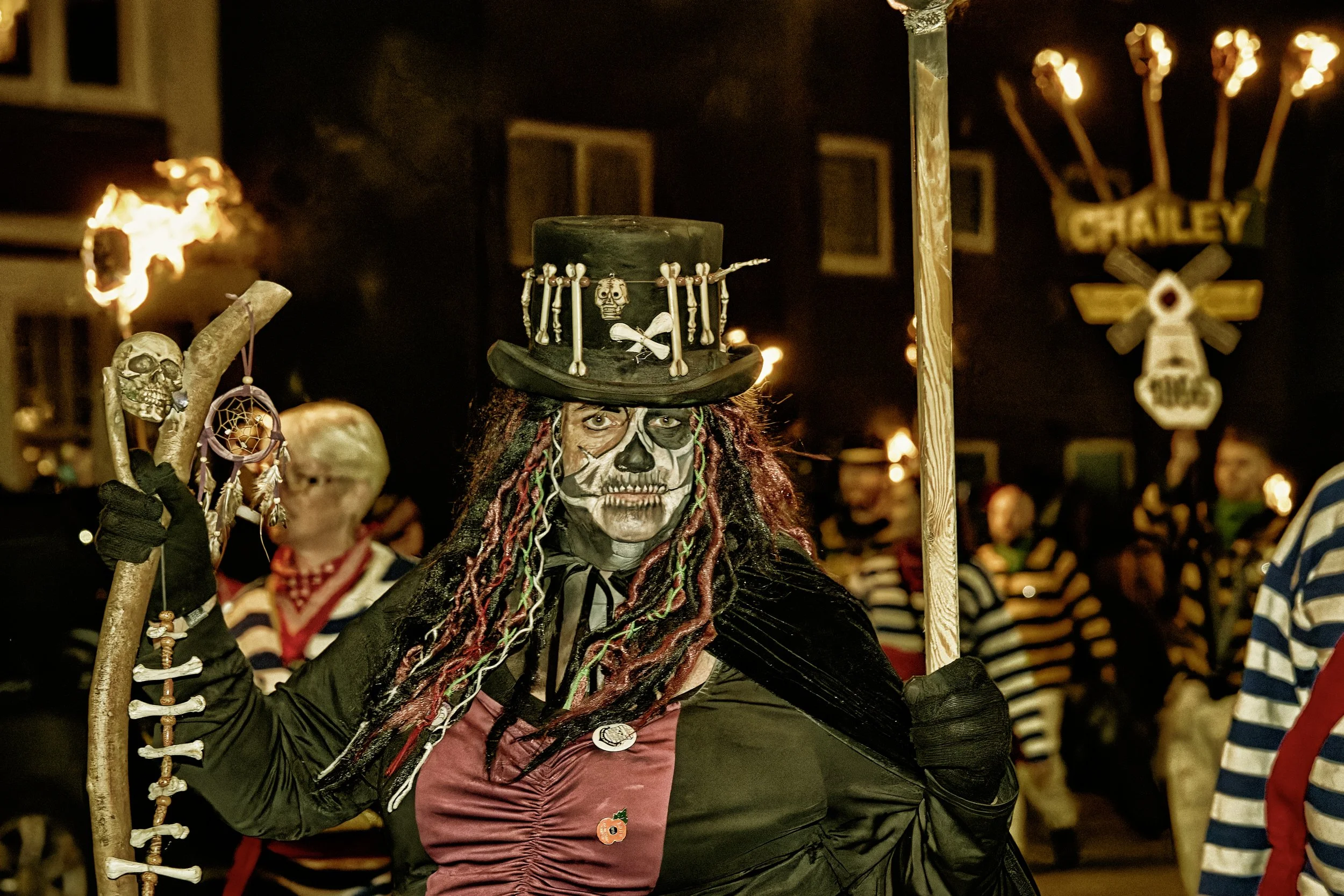 Documentary fieldwork photograph of a Sussex Bonfire Society parade in Seaford, showing guising in spooky halloween themes