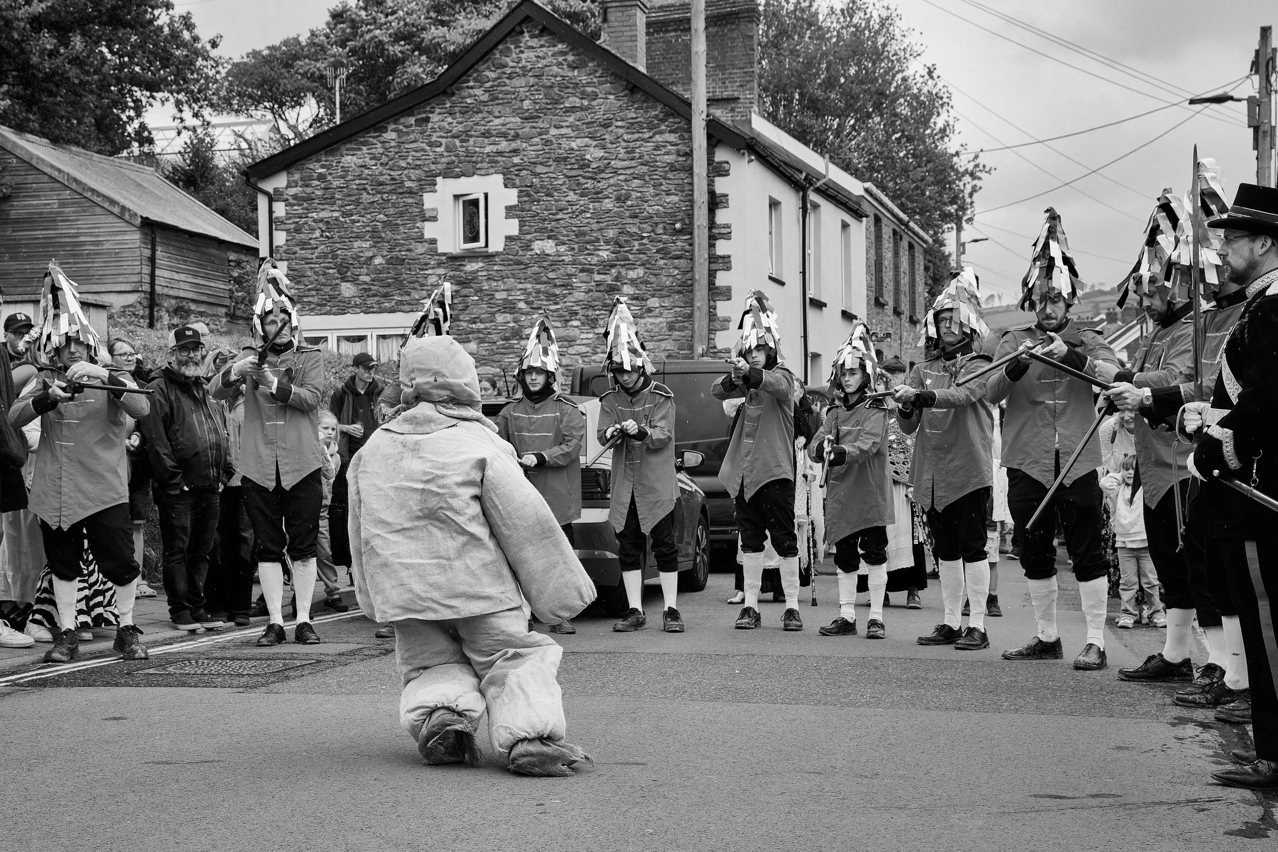 Documentary fieldwork photograph of Hunting the Earl of Rone in Coombe Martin, showing the Earl of Rone firing squad