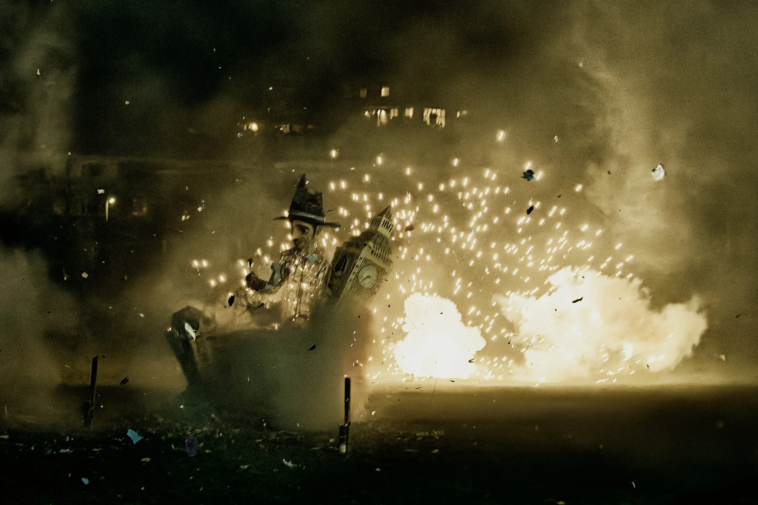 Documentary fieldwork photograph of a Sussex Bonfire Society parade in Seaford, showing The Houses of Parliement explode
