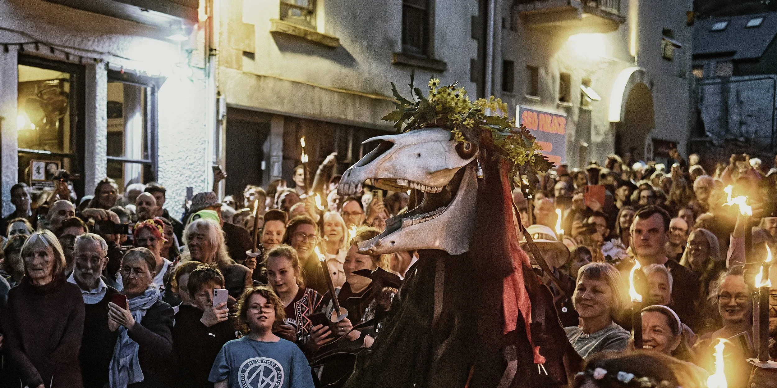 Documentary fieldwork photograph of Golowan Torch Lit parade in Penzance showing Penglaz