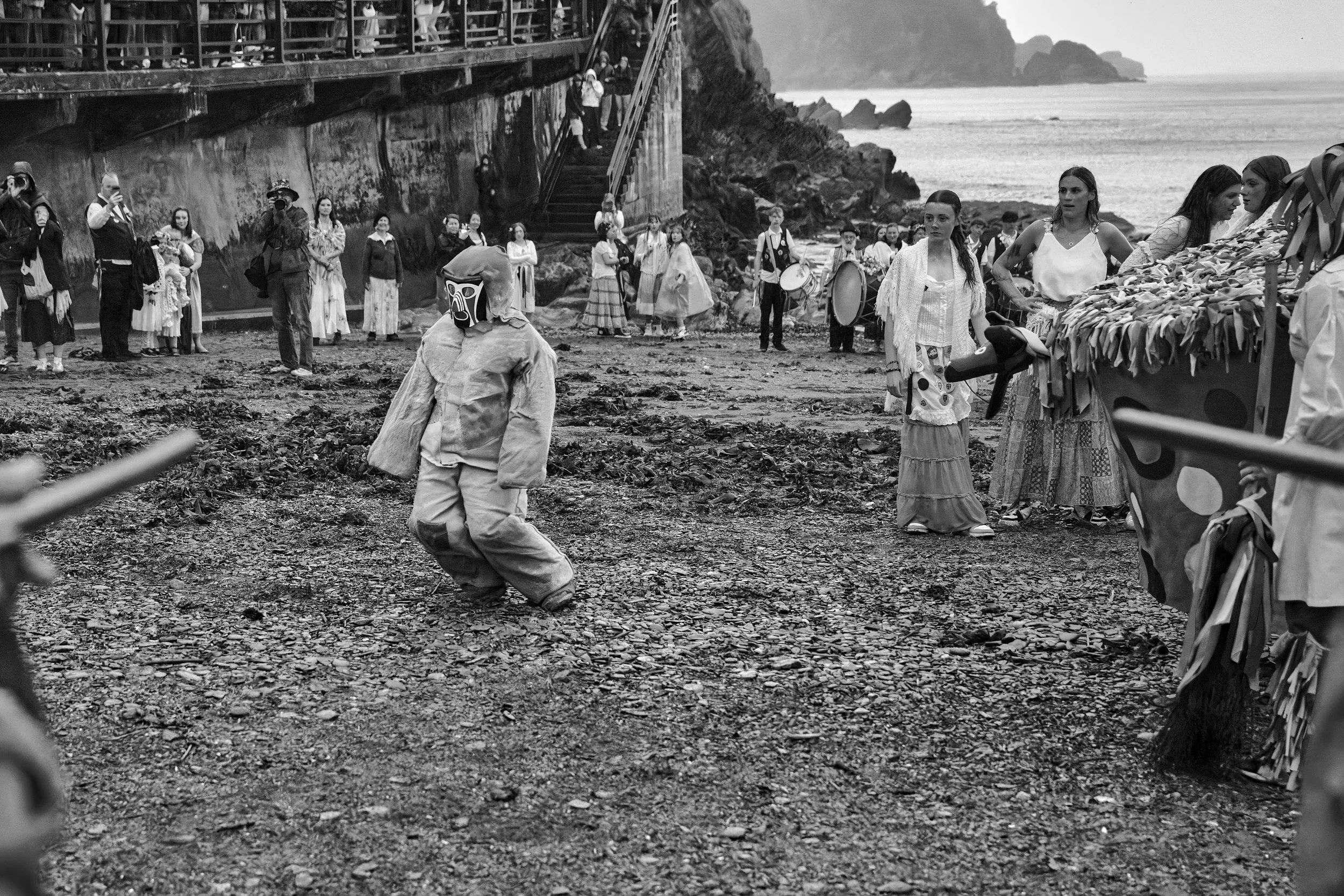 Documentary fieldwork photograph of Hunting the Earl of Rone in Coombe Martin, showing the final Beach Firing Squad