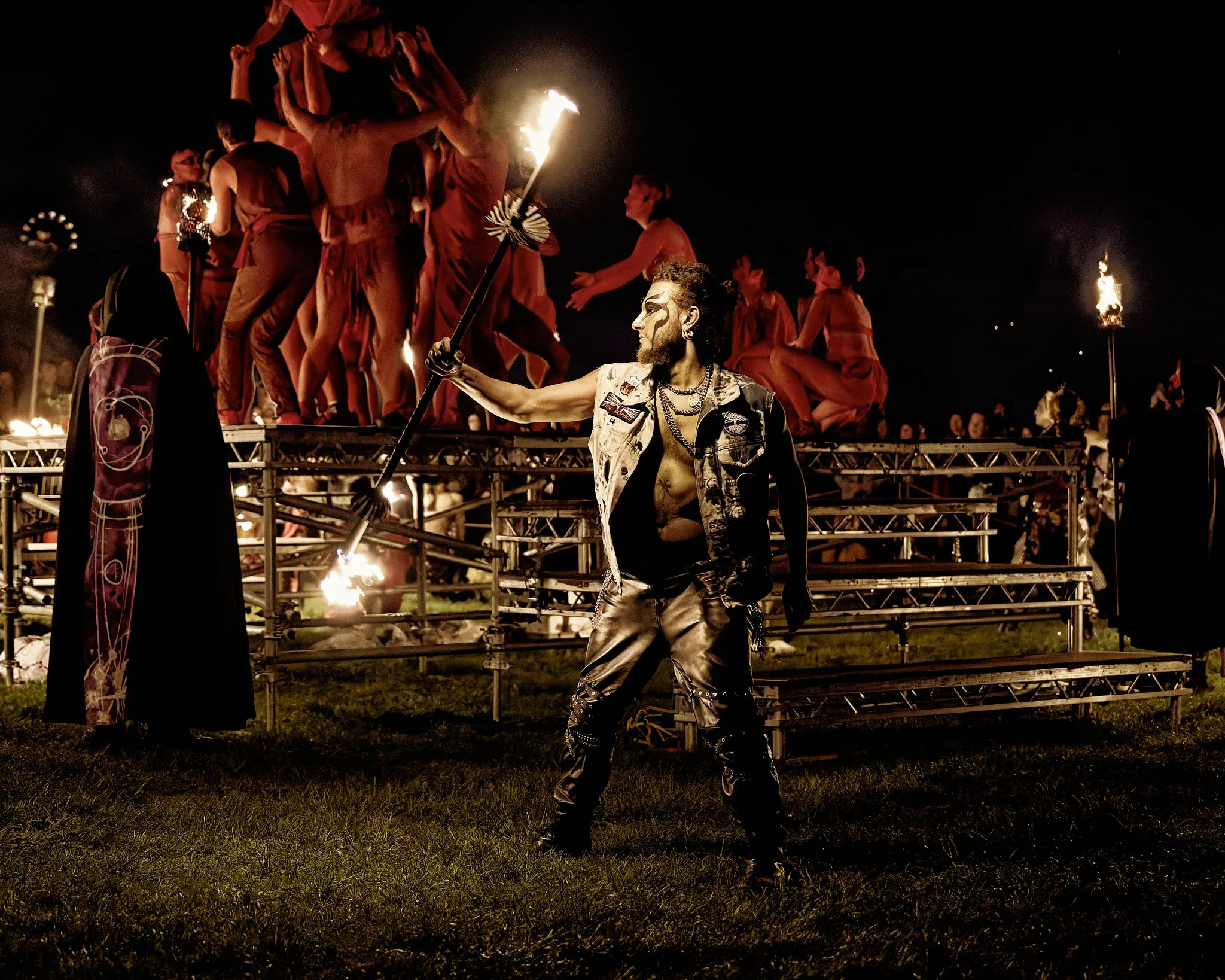 This documentary fieldwork photograph is of a team ‘Firearchy’ member juggling fire at Edinburgh Beltane 2026.