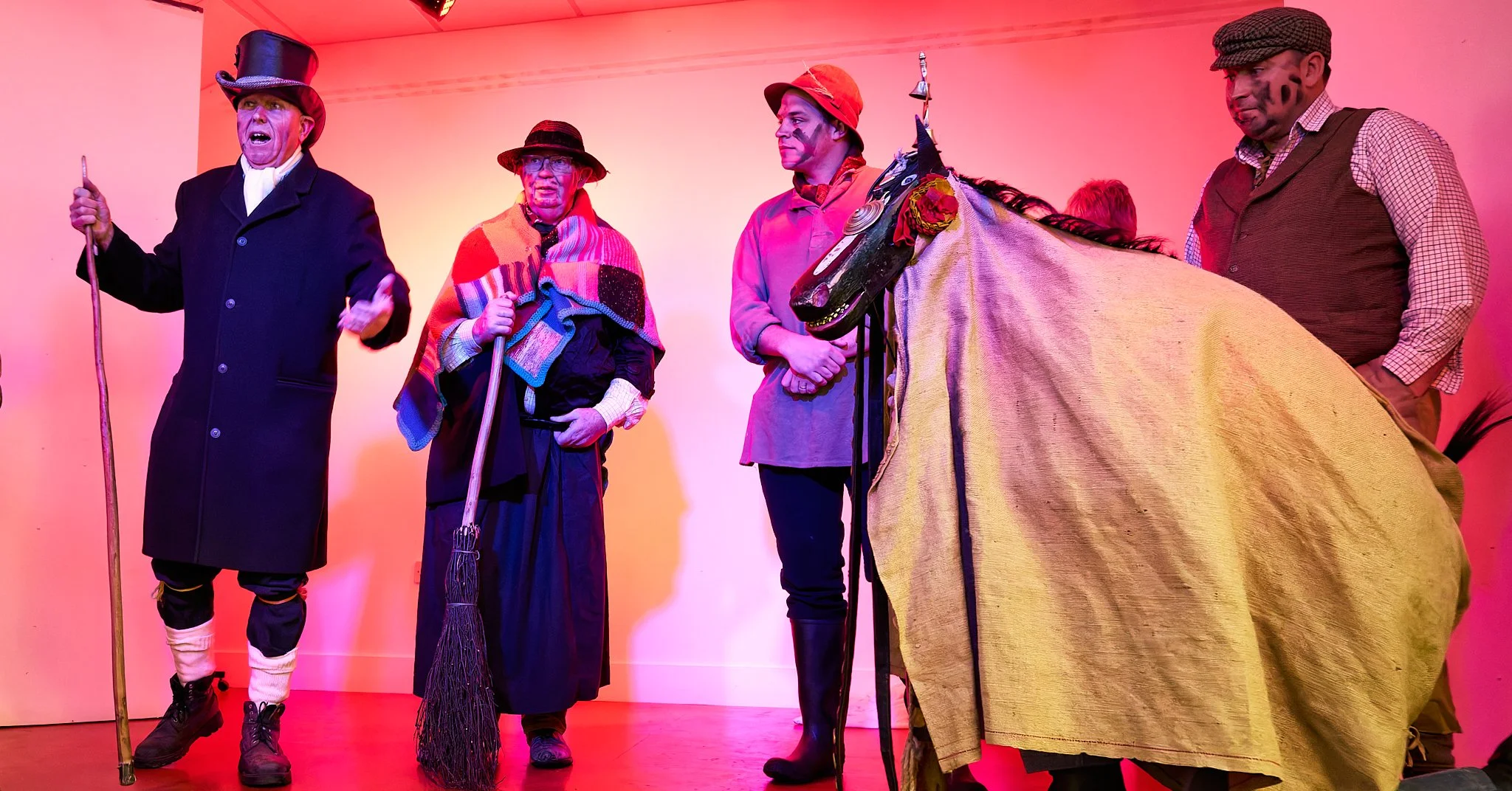 Documentary fieldwork photograph of The Hoodeners in Monkon Village Hall, showing The Hooden Horse
