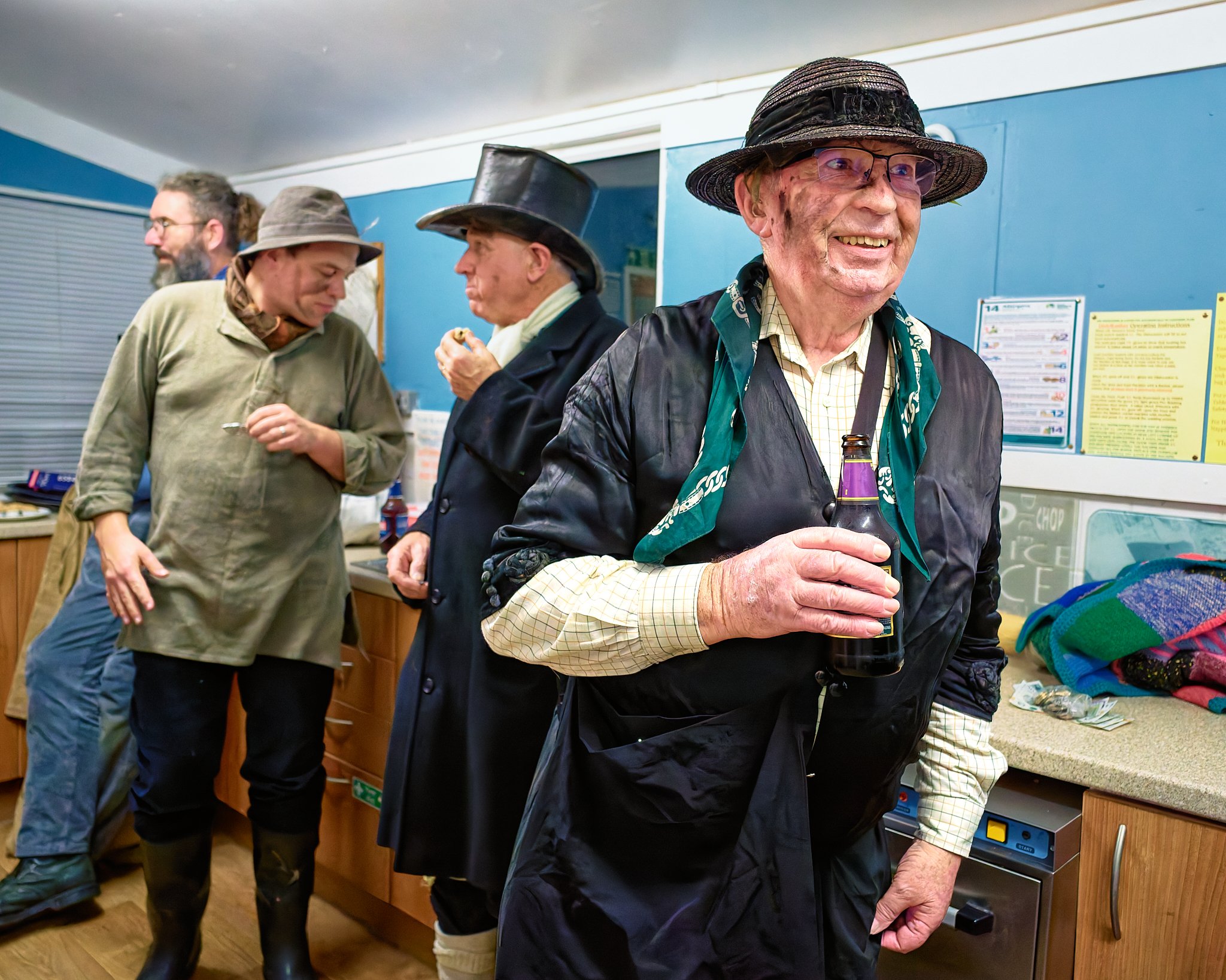 Documentary fieldwork photograph of The Hoodeners in Monkon Village Hall, showing The Molly relaxing post performance
