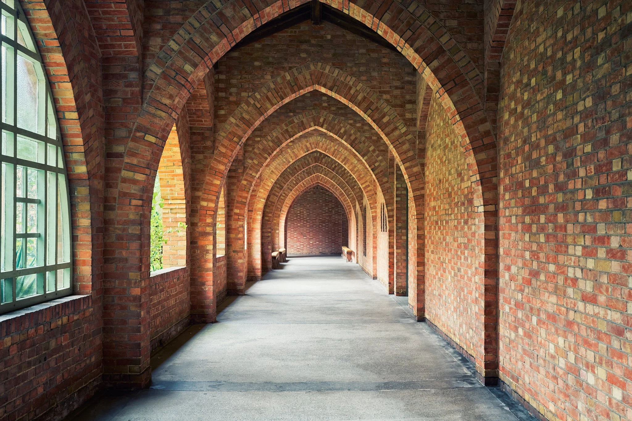 This documentary fieldwork photograph is of the cloister of New Quarr Abbey. It shows how Dom Bellot’s architecture once again organises monastic life around church and cloister.