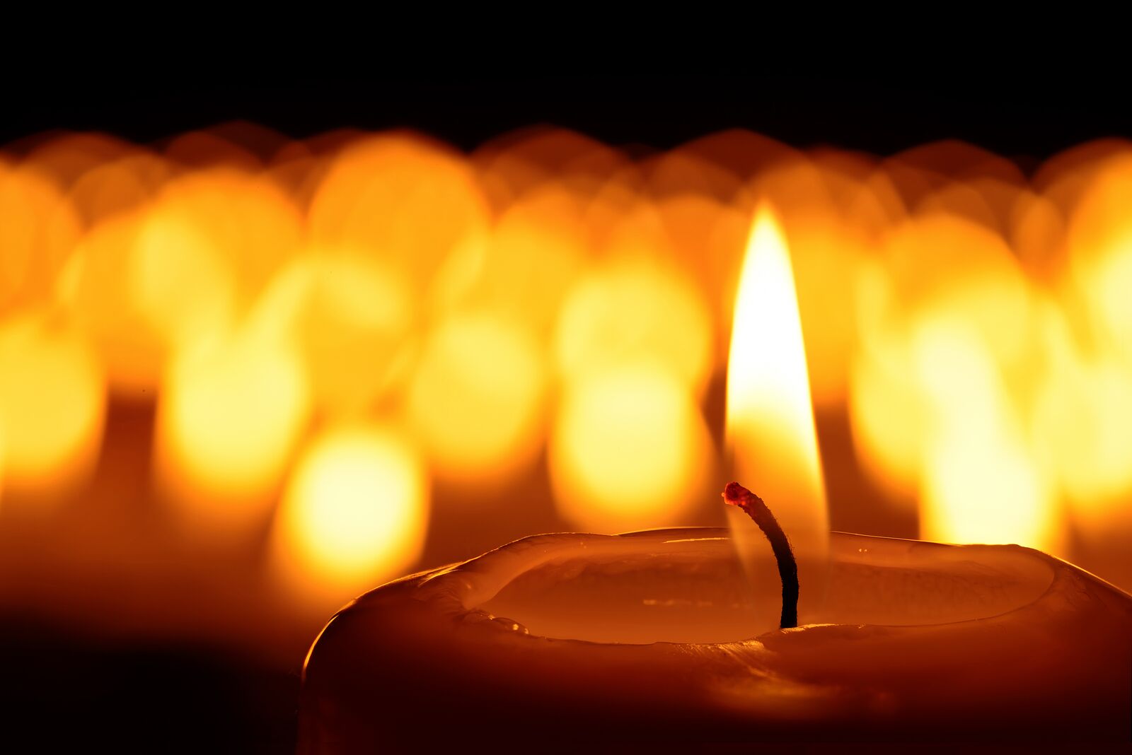 bigstock-A-Sea-Of-Candles-108290075_preview.jpeg