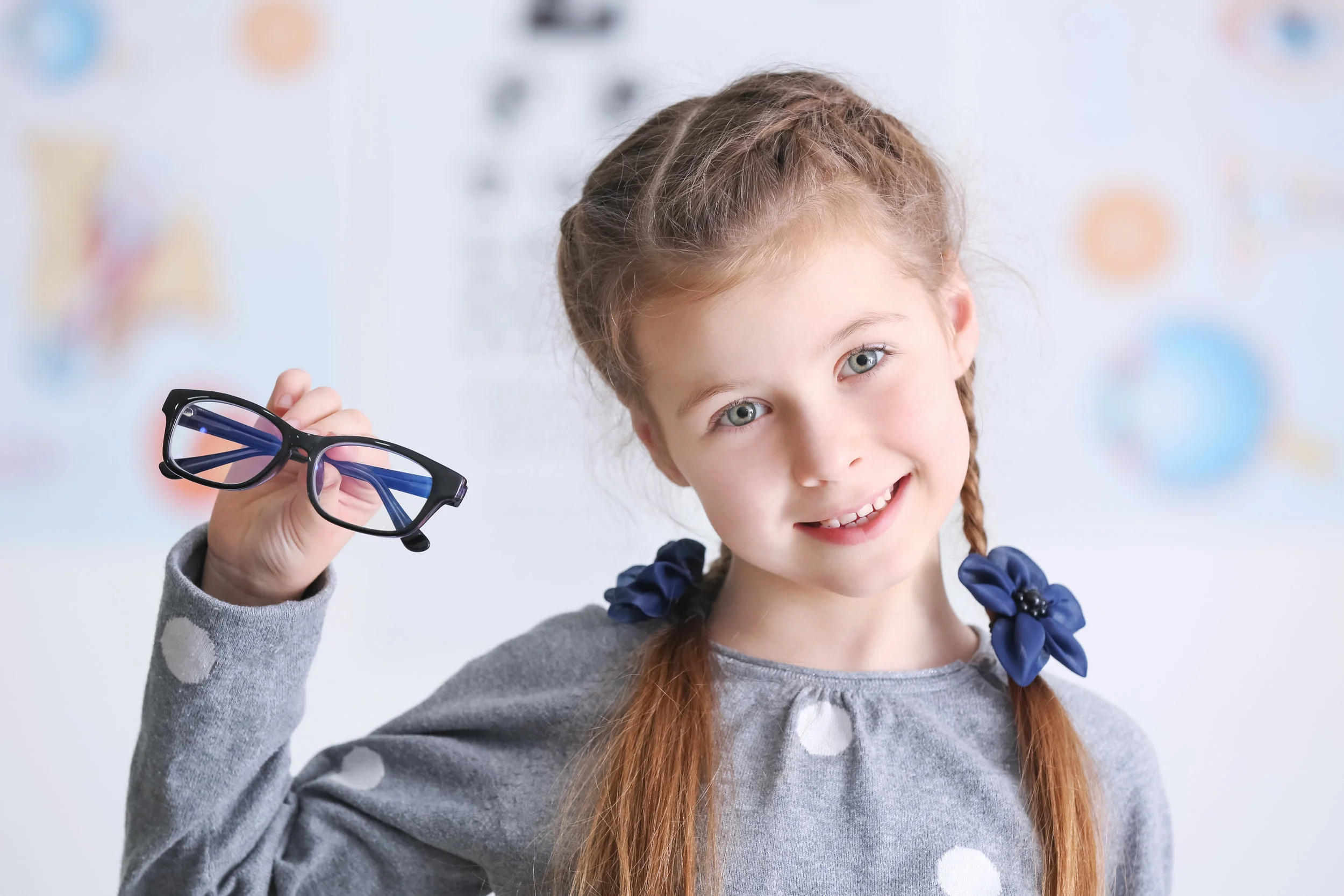bigstock-Cute-little-girl-with-glasses--181836682.jpg