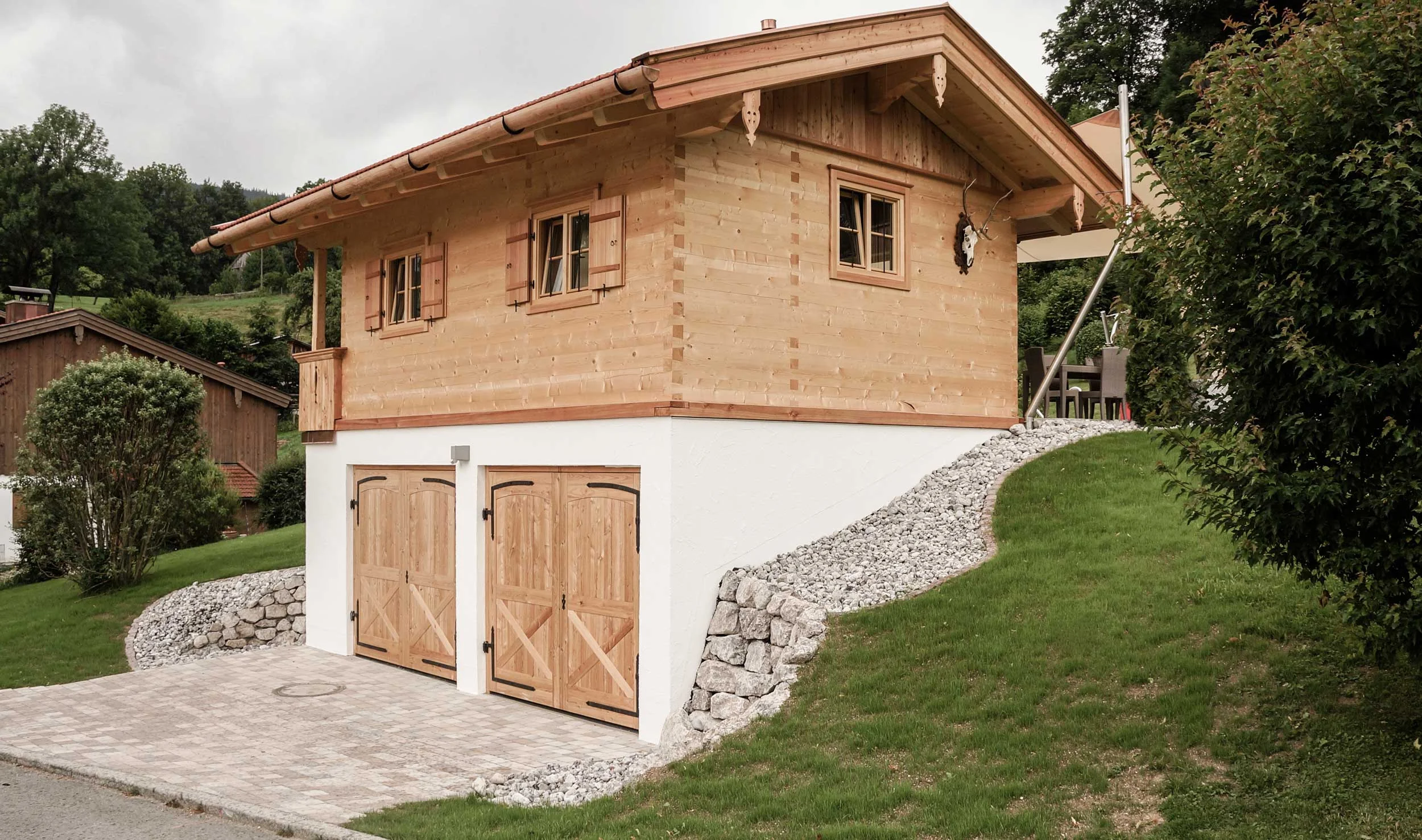 Blockhaus mit Garage Projekt — ZIMMEREI STOIB