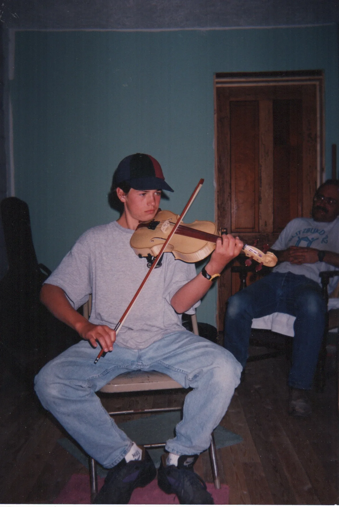 Toby playing his new violin at his fiddle lesson with Jeri Halford
