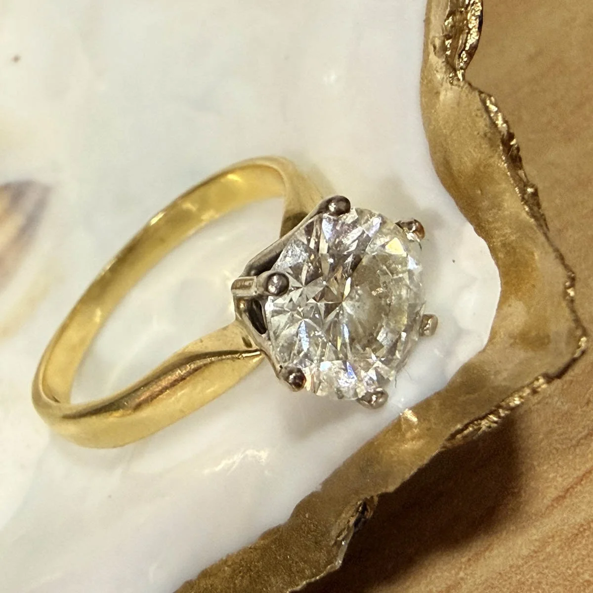 Yellow gold diamond solitaire ring