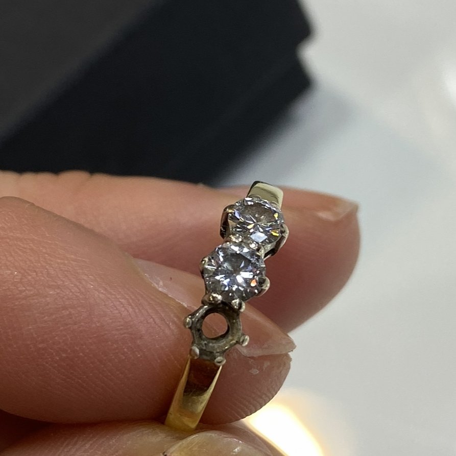 ring with missing diamond