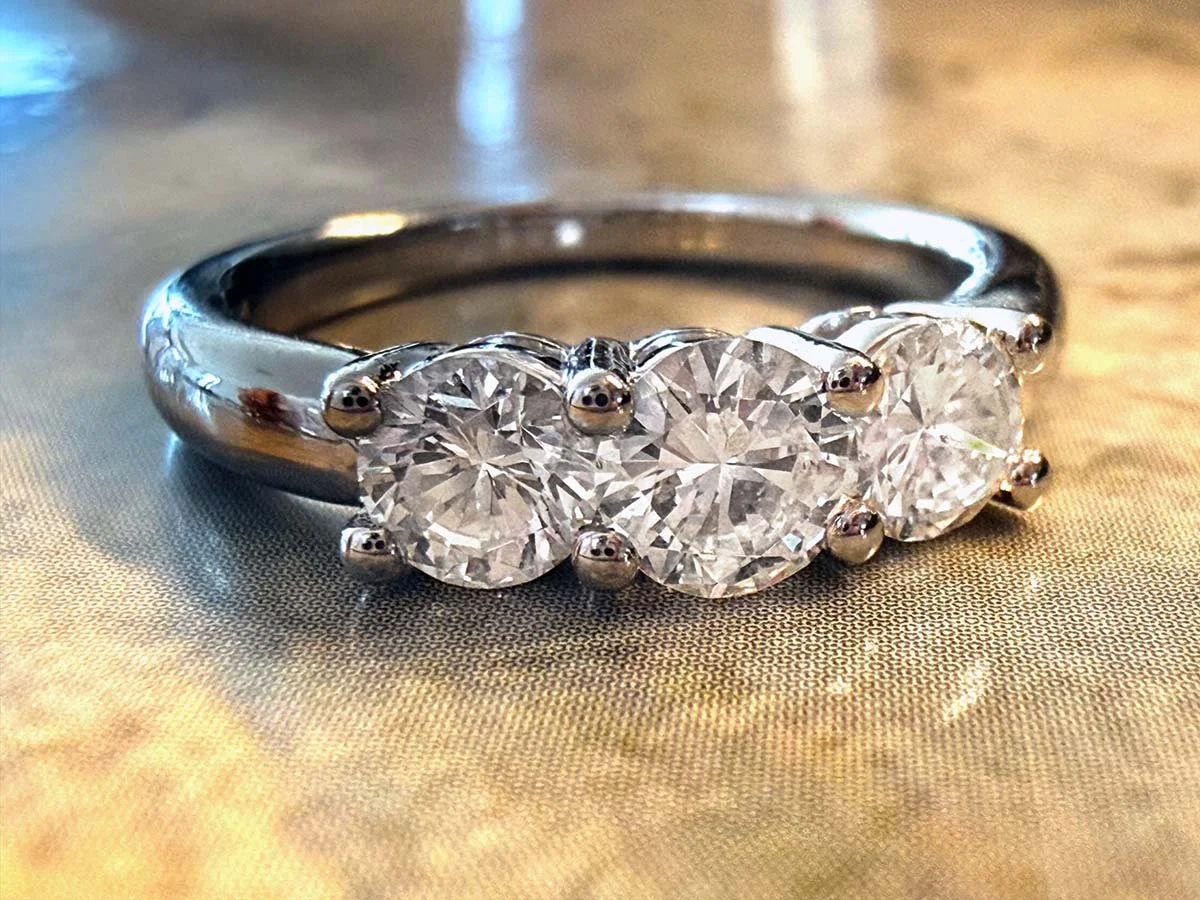 The finished trilogy engagement ring