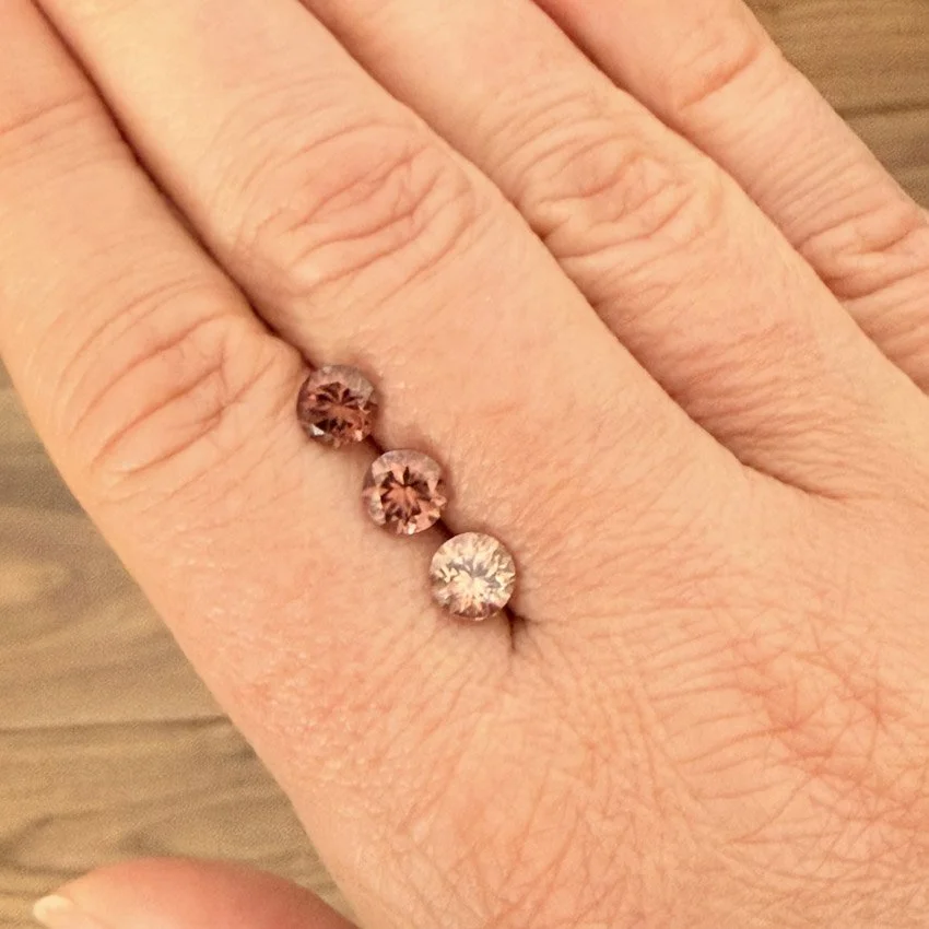 three natural zircons