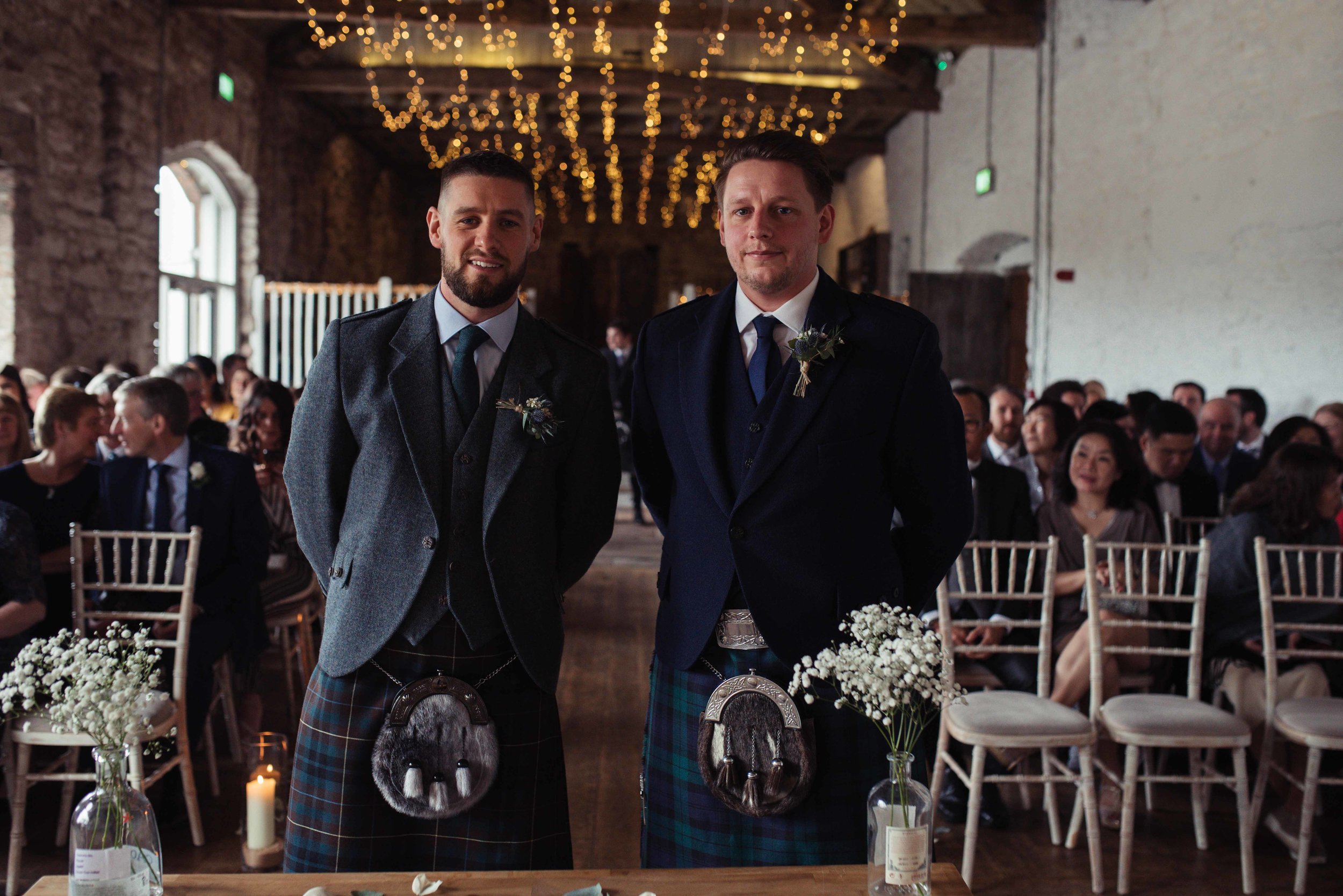 The groom and his best man stand ready and waiting for the bride to make her entrance