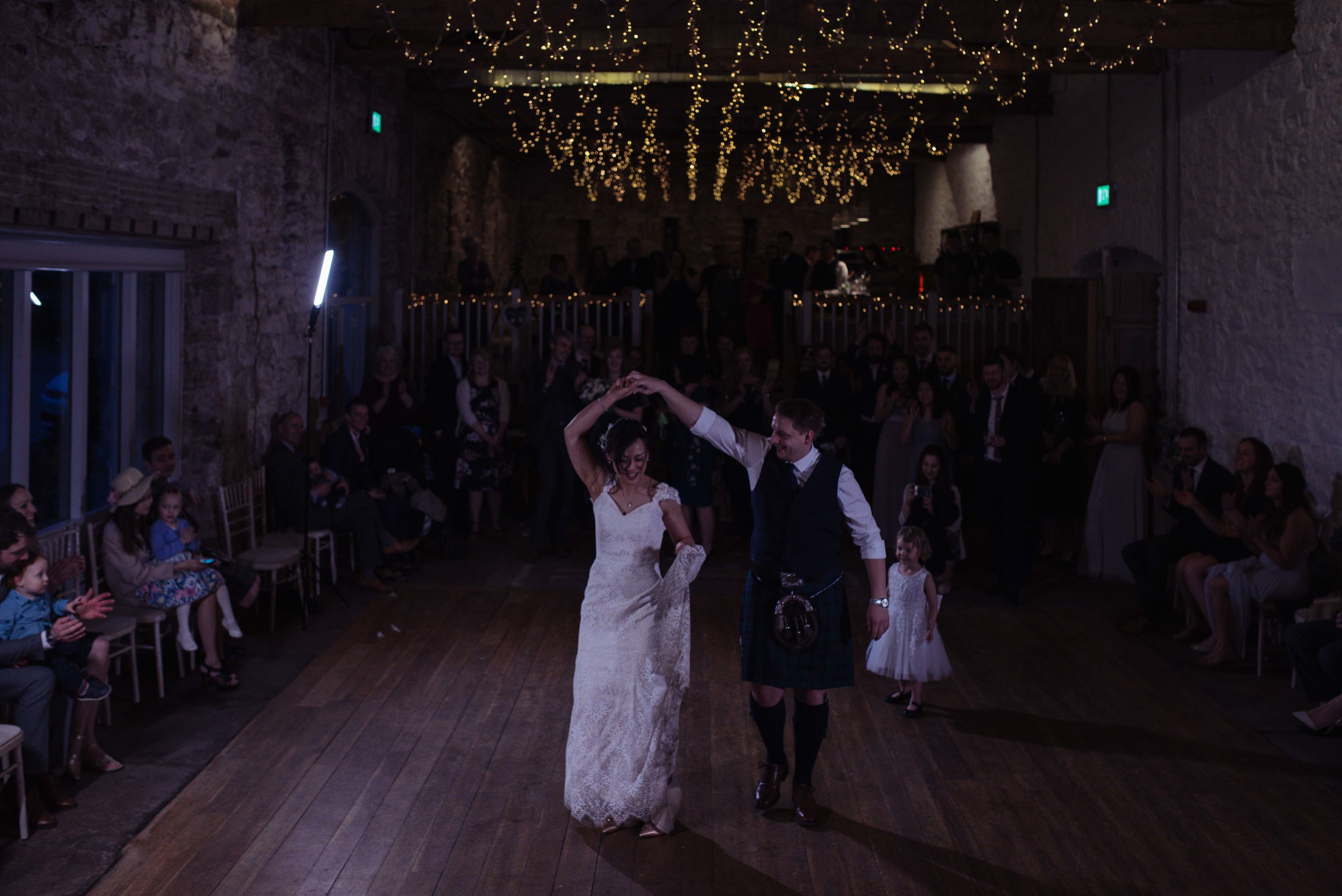 The bride and groom have their first Scottish dance