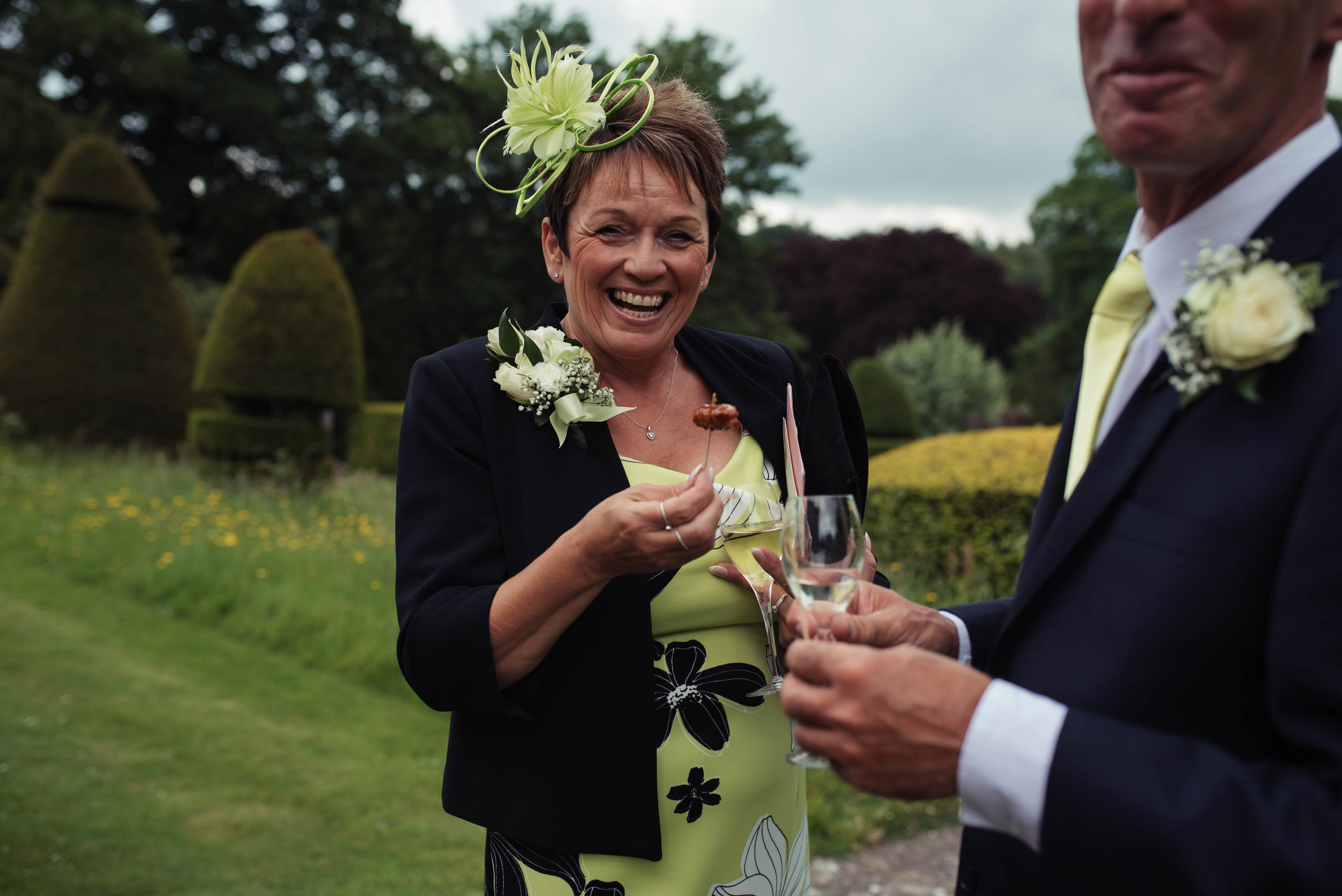 A wedding guest proudly displays her sausage