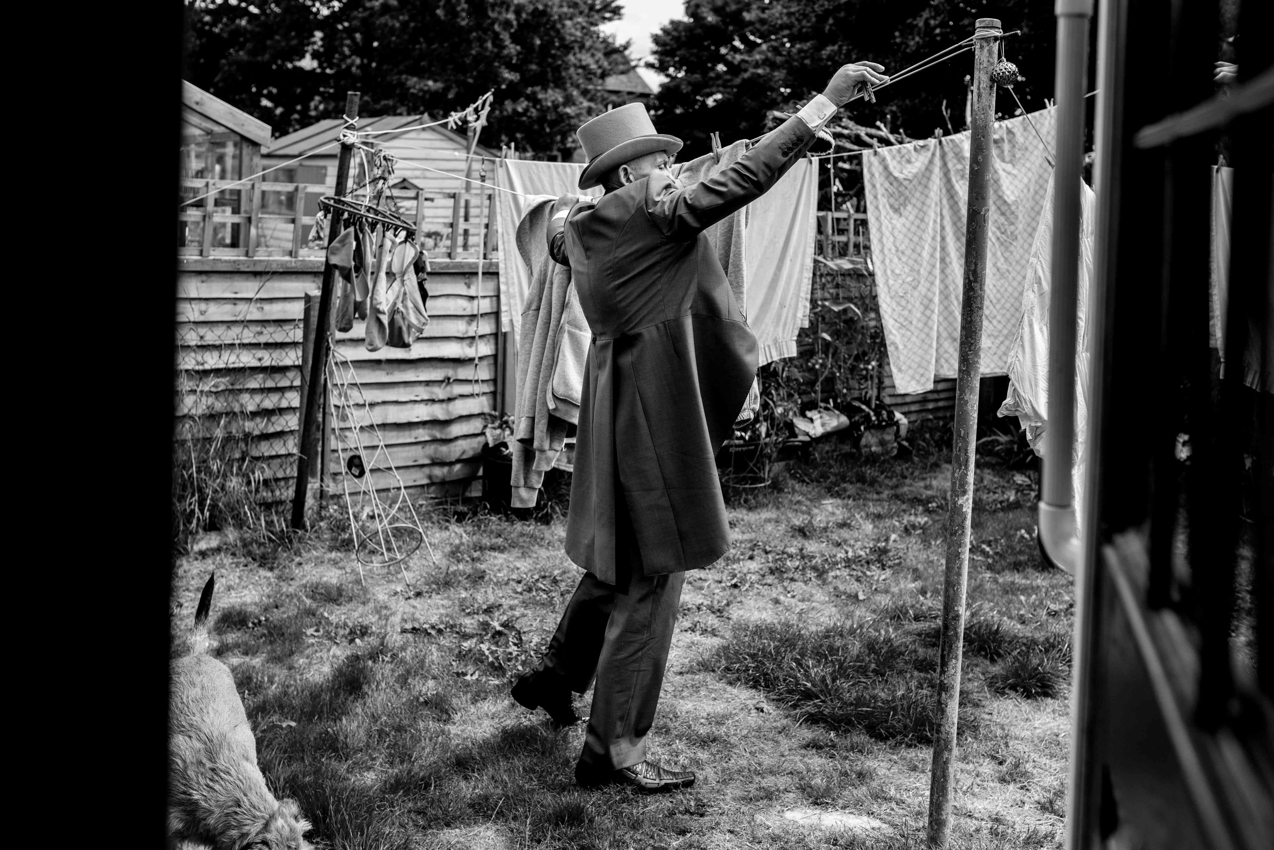 Groom hangs his washing out on the morning of the wedding