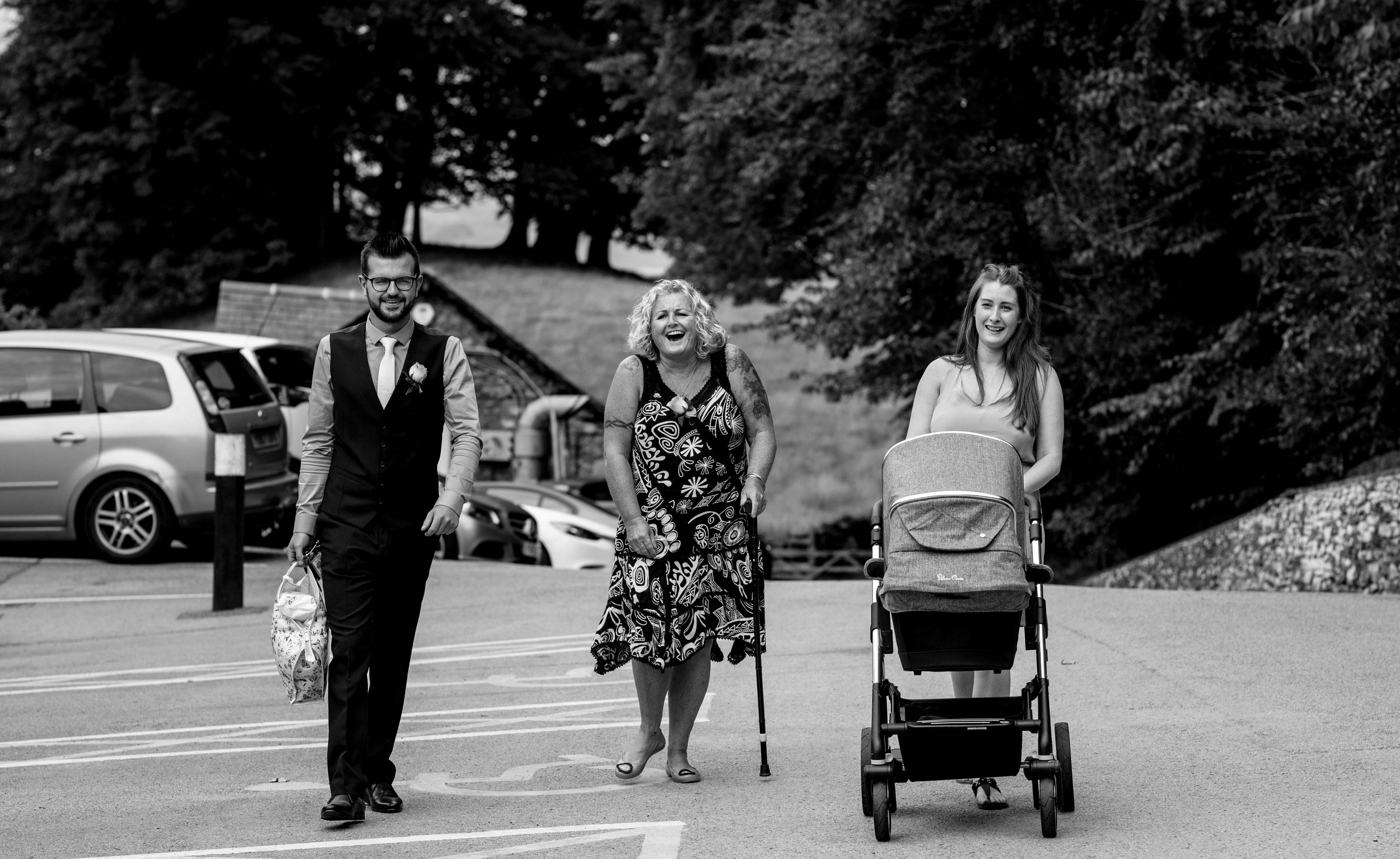 Guests are seen smiling as they walk towards the castle green hotel kendal