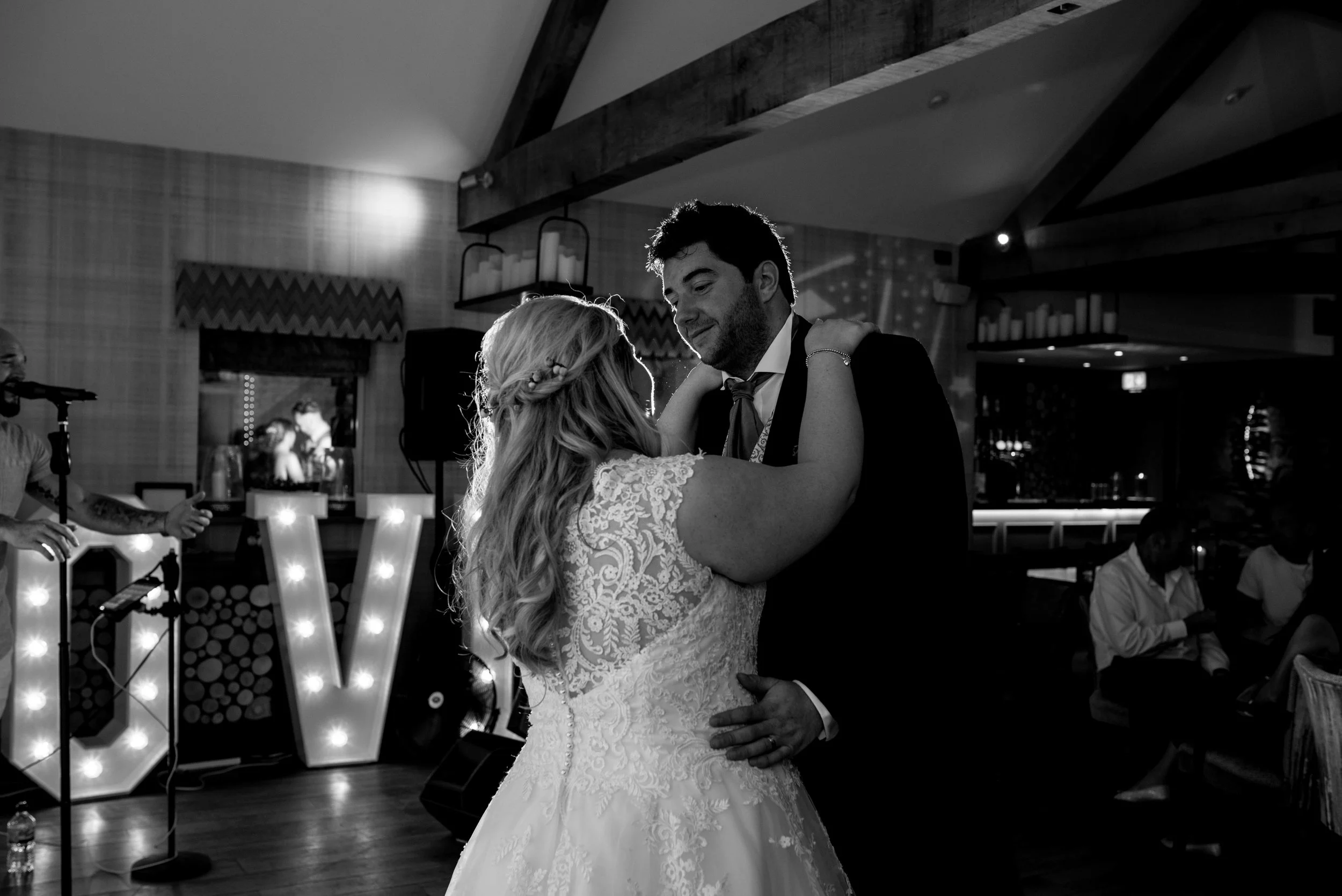 The bride and groom have their first dance