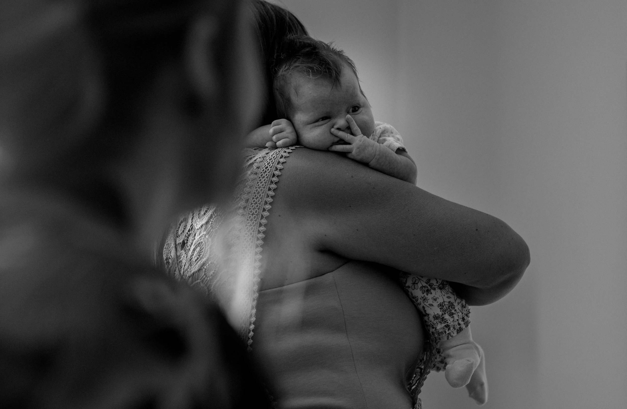 A newborn baby during bridal preps