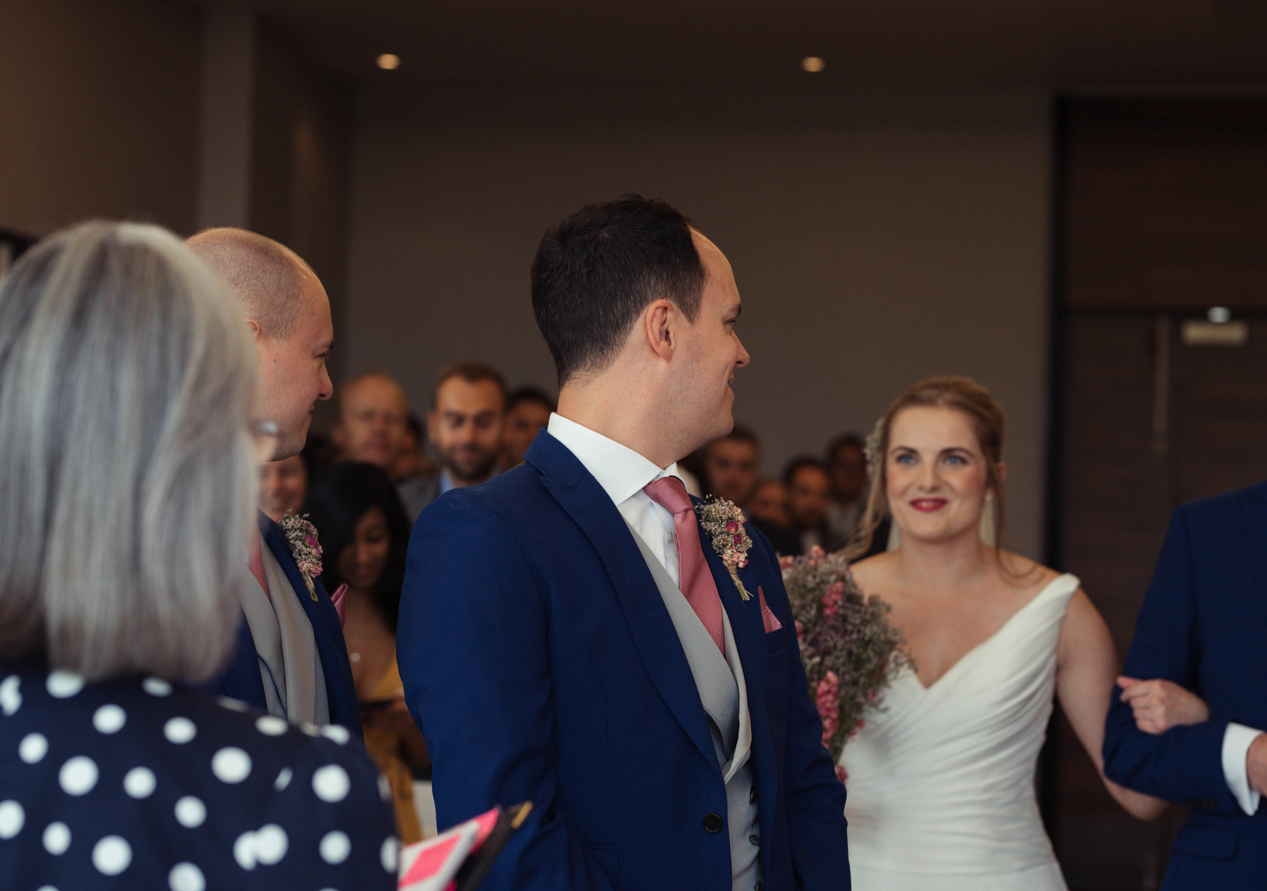 The groom sees his bride for the first time