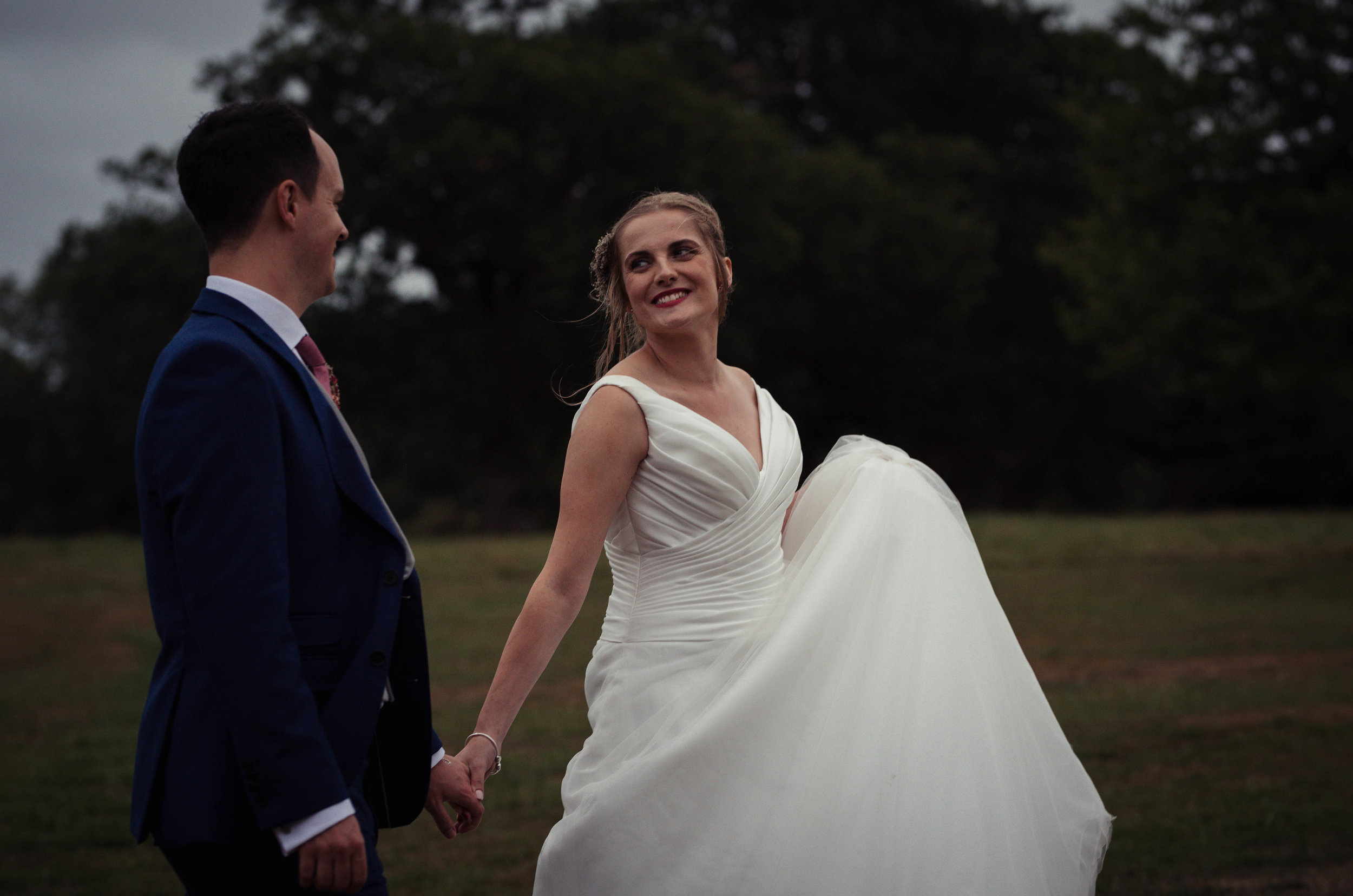 The bride and groom having a walk together