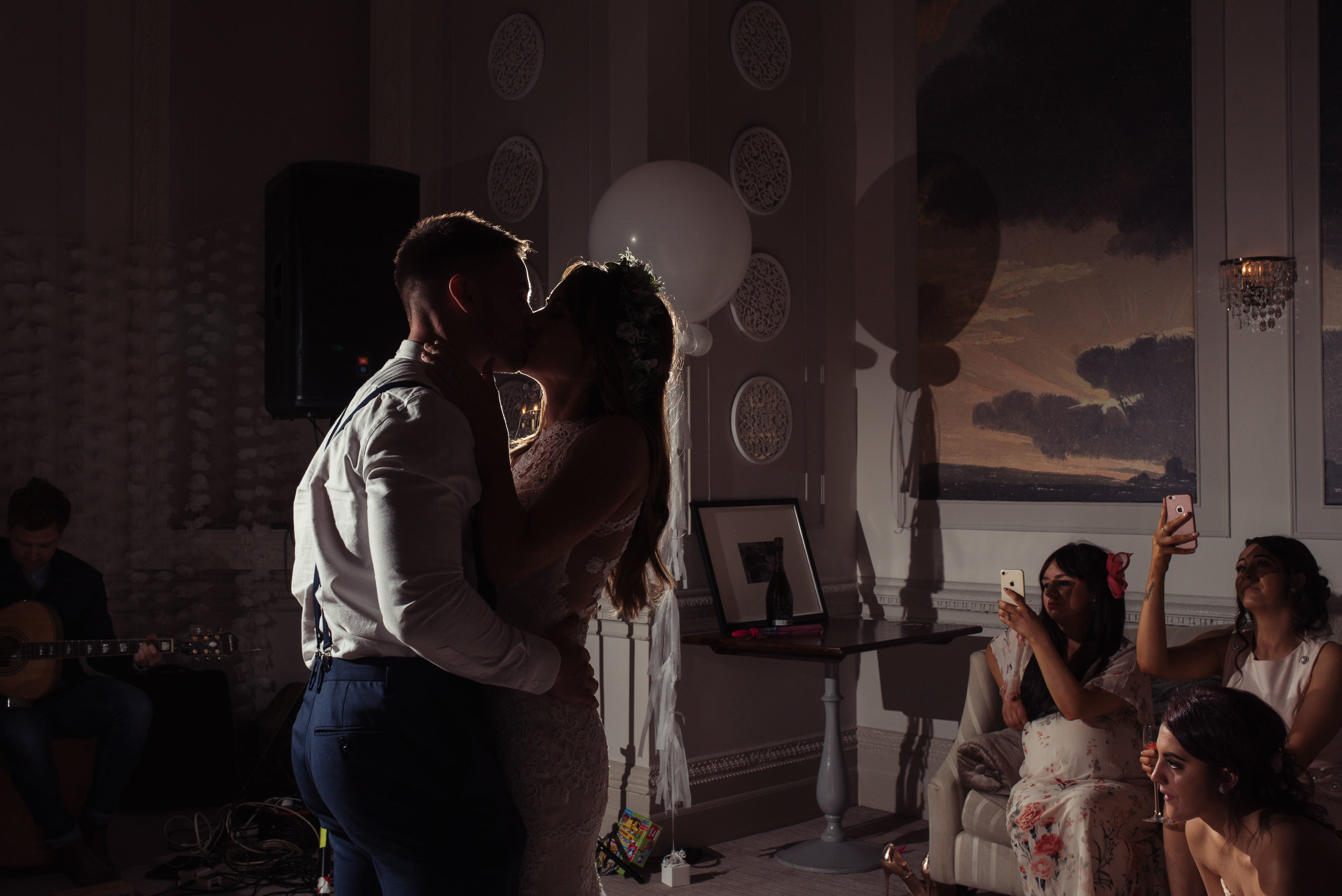 The bride and groom have their first dance