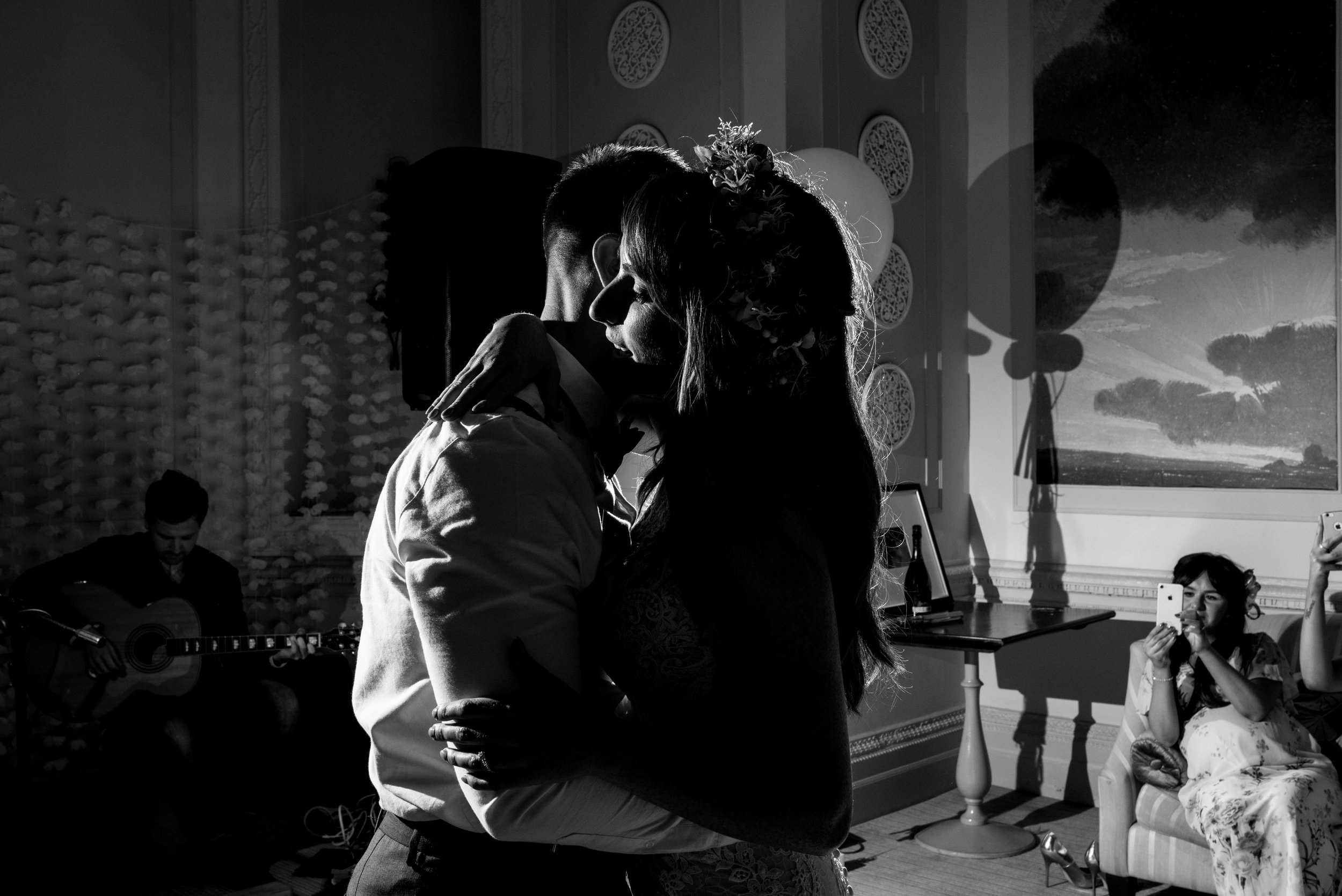 Black and white image of the bride and grooms first dance at the Belsfield