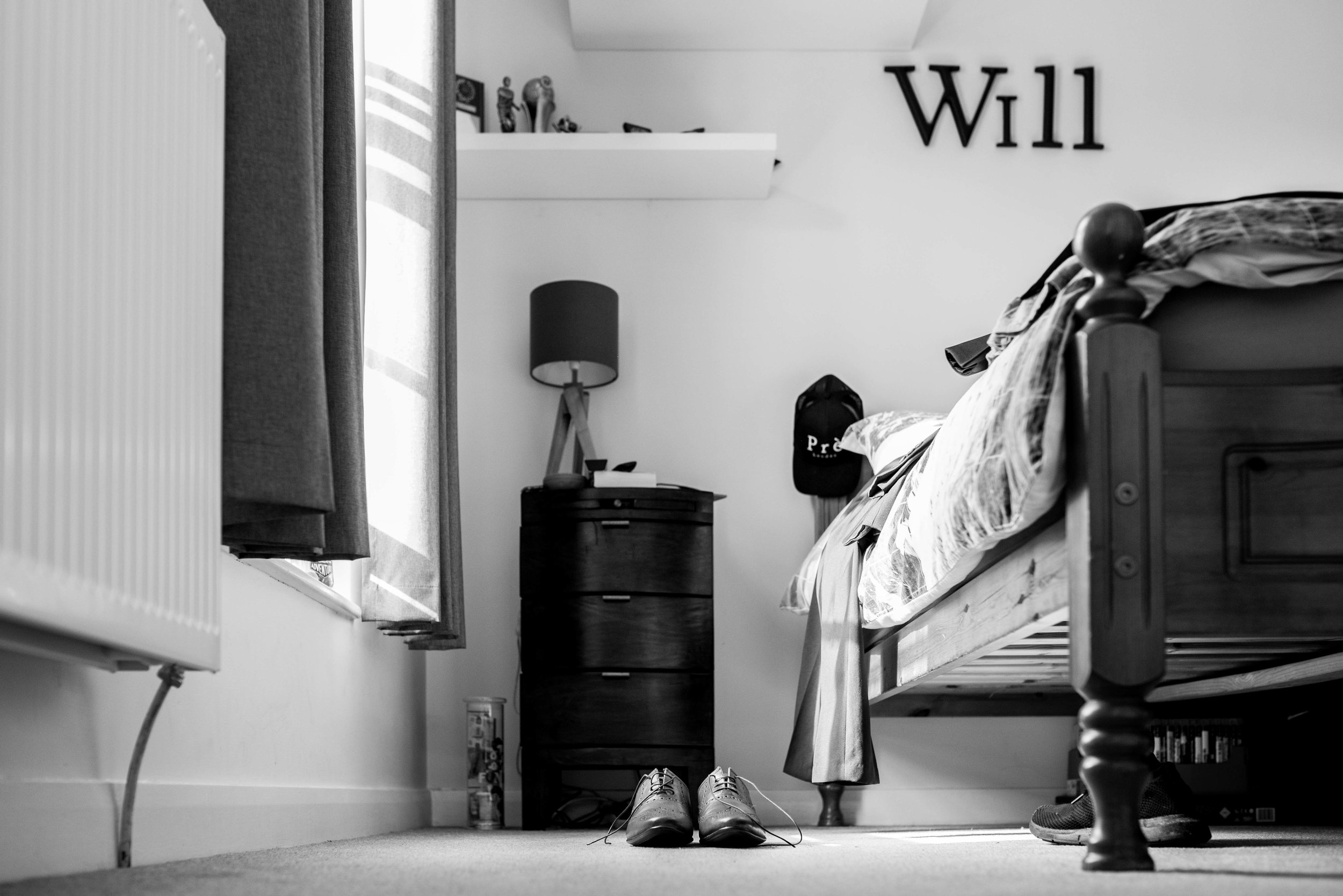 The brides son's bedroom with his shoes
