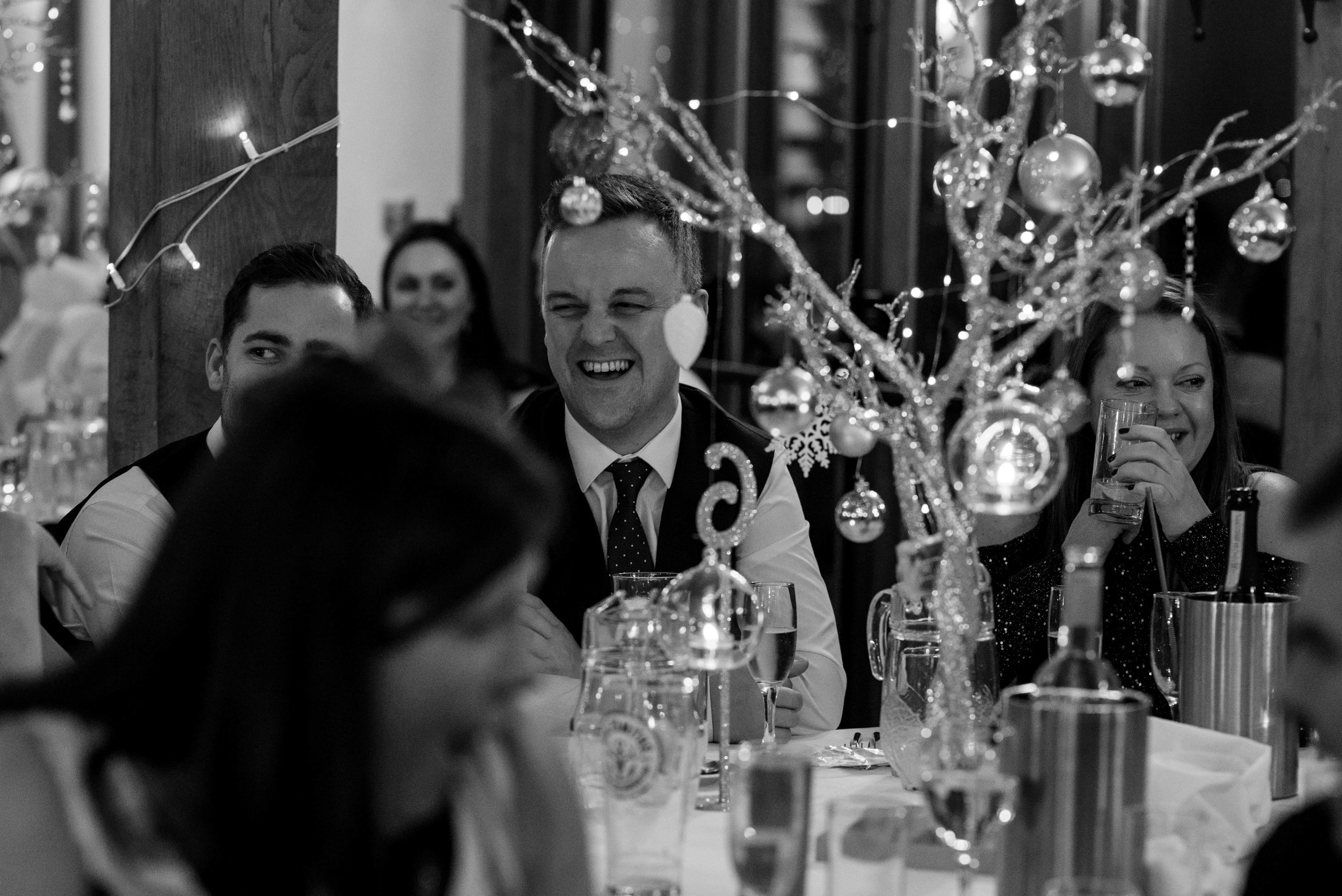 Guests watch and laugh during the speeches