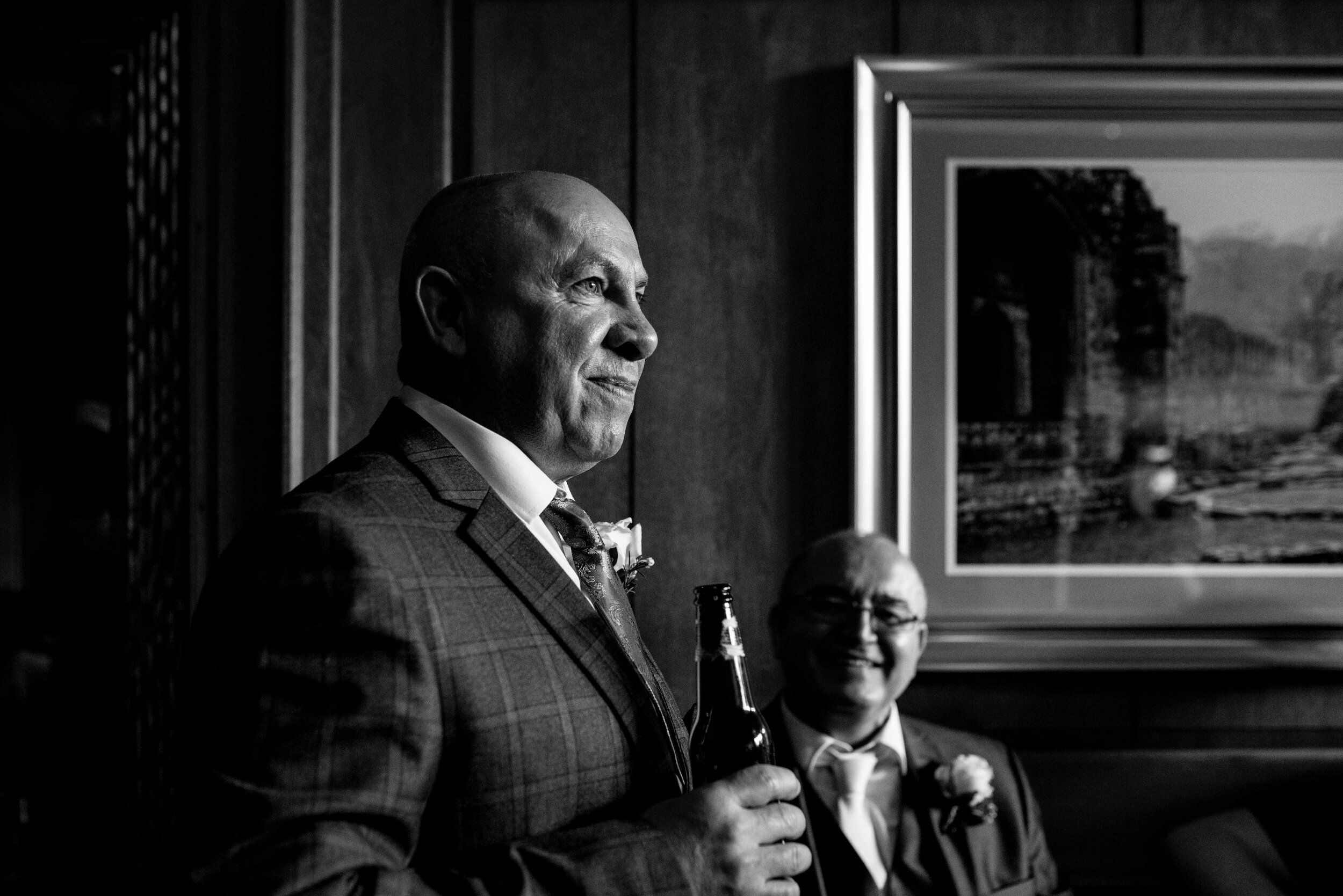 Black and white portrait of the father of the bride