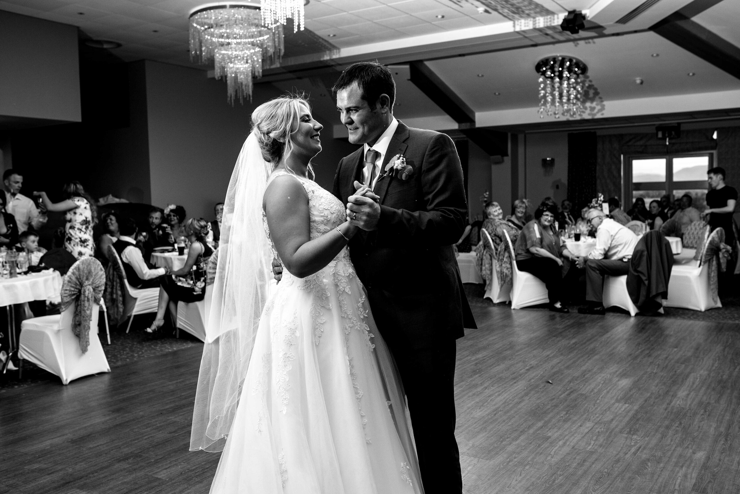 Bride and grooms first dance in black and white