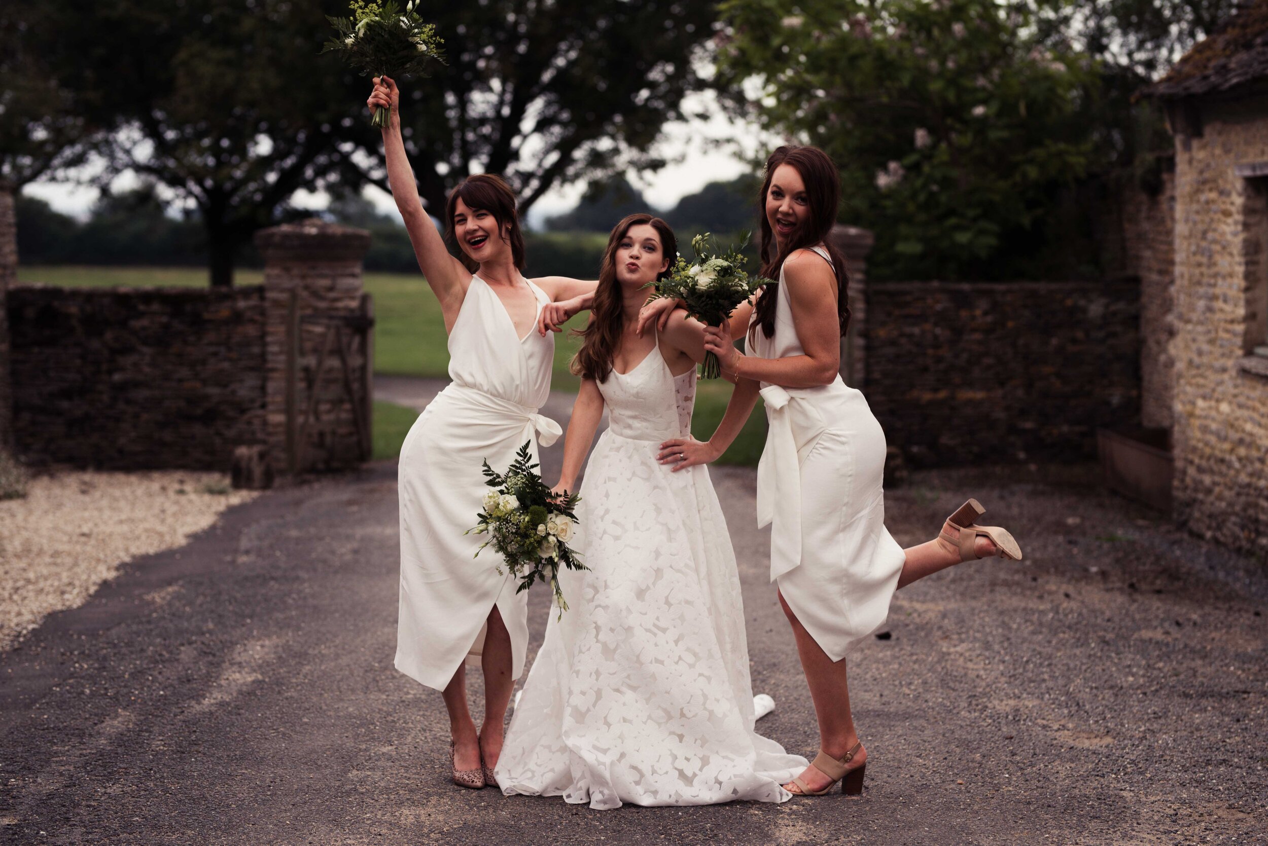 Bridesmaids throwing a pose