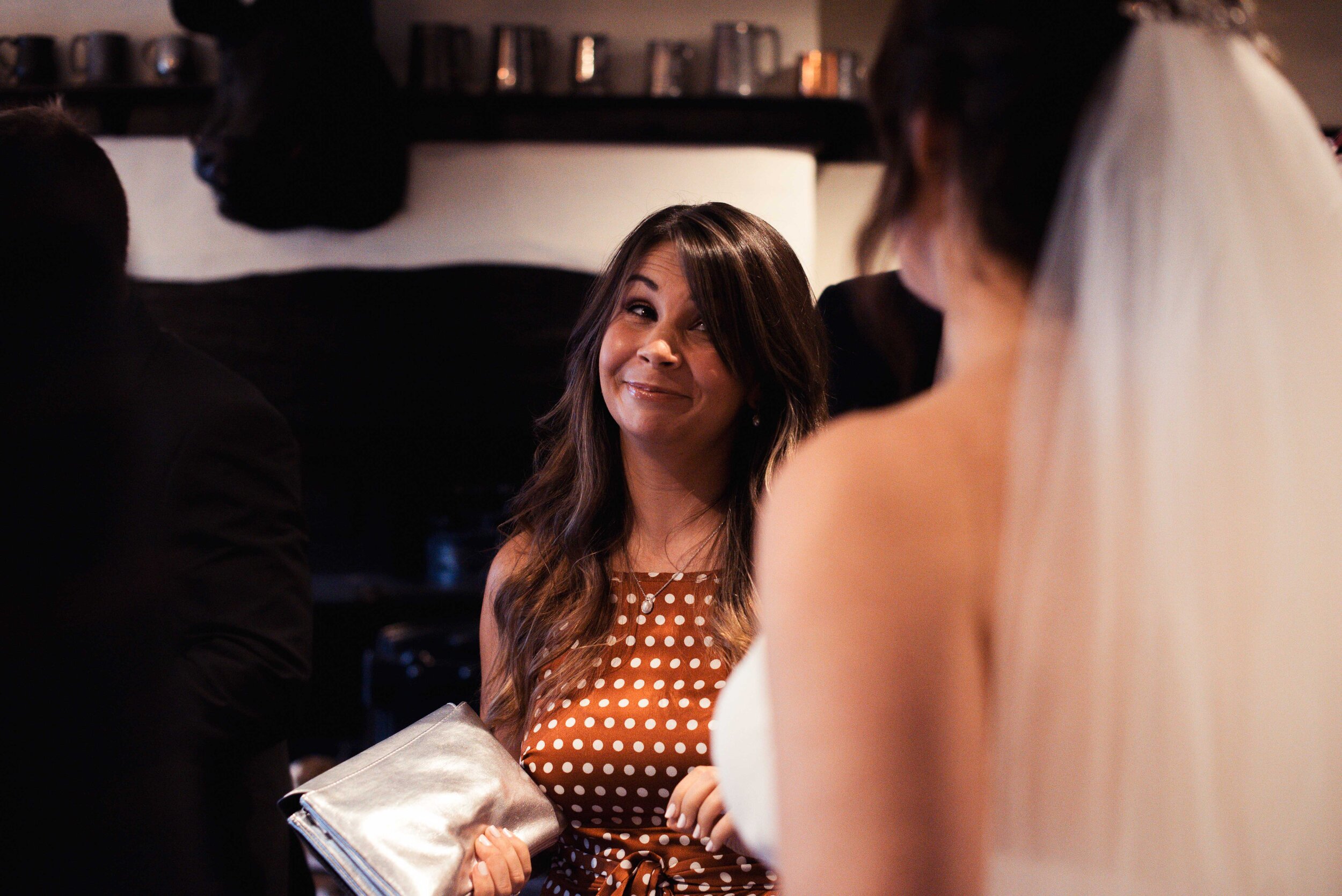 Wedding guest greets the bride after the ceremony