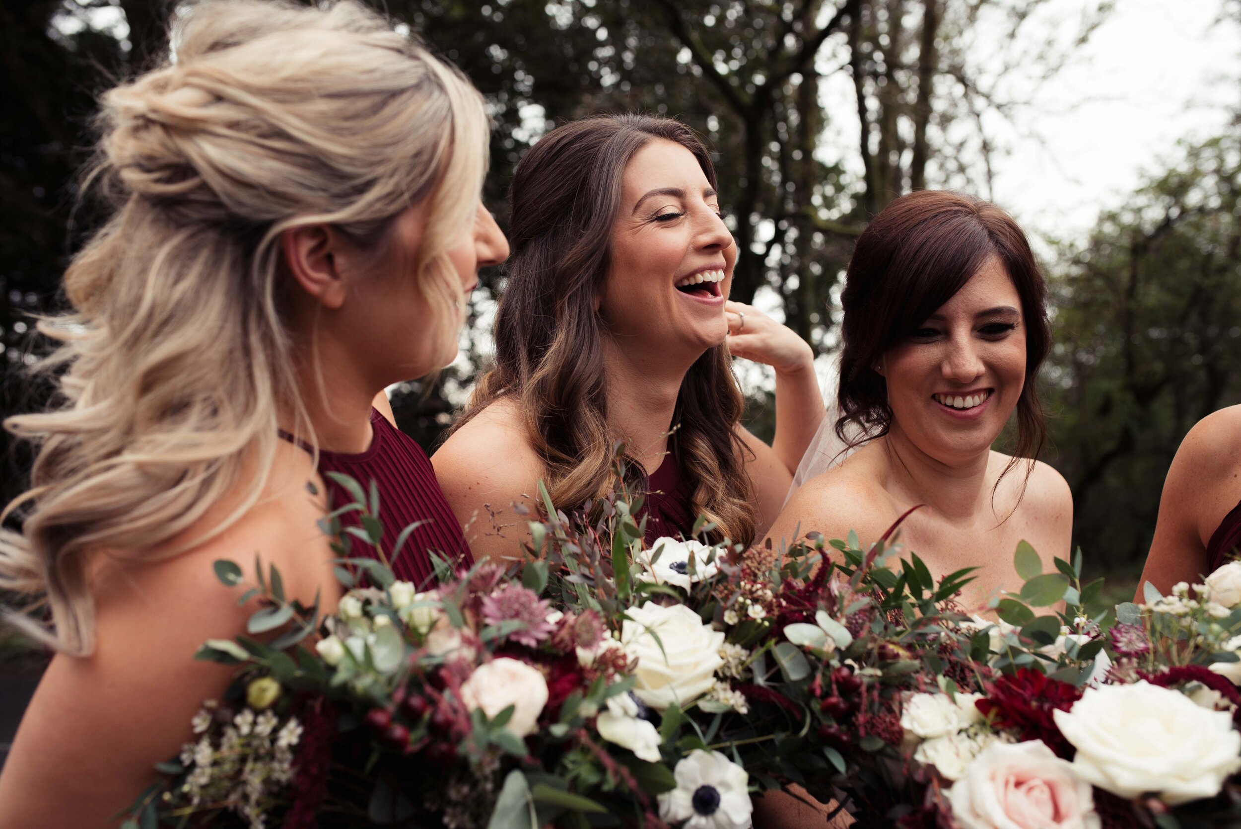 bridesmaids laughing outside the wild boar