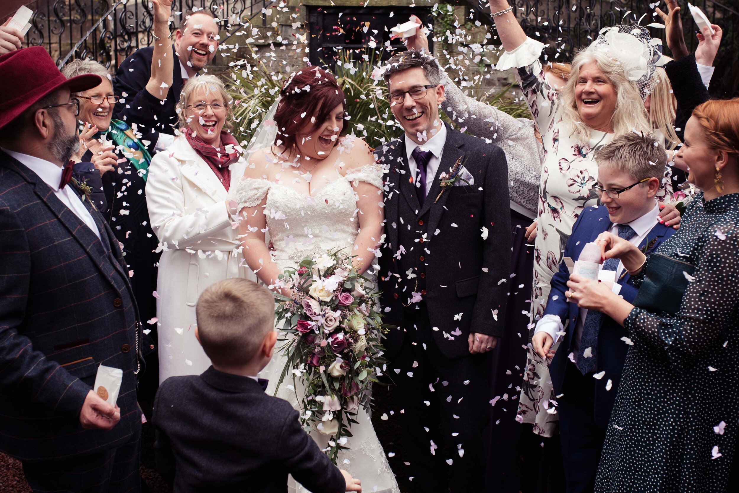 Bride and groom get covered in confetti at Edinburgh Zoo